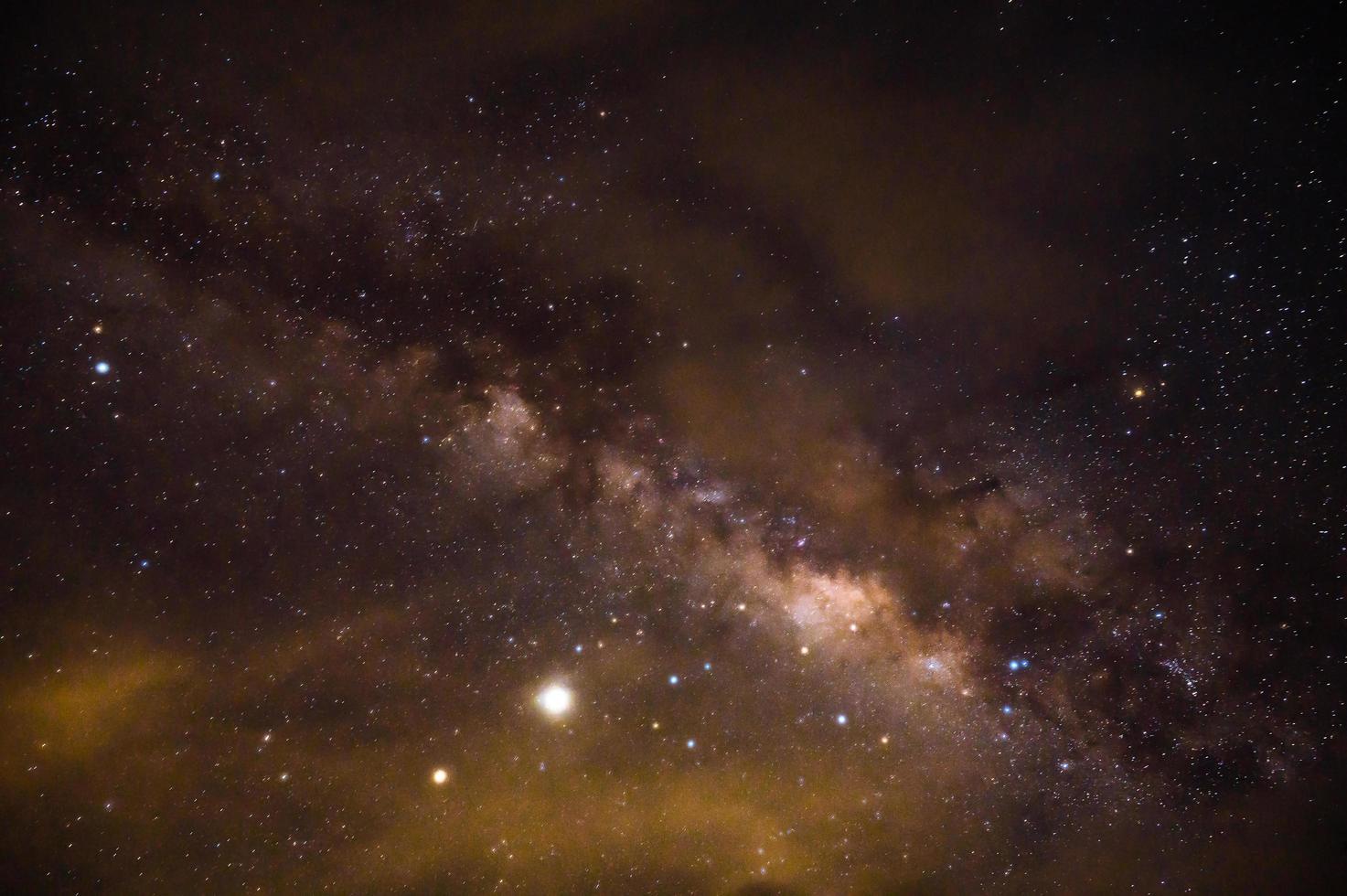 Landscape view with Milky way Galaxy and millon star on the sky in night time photo