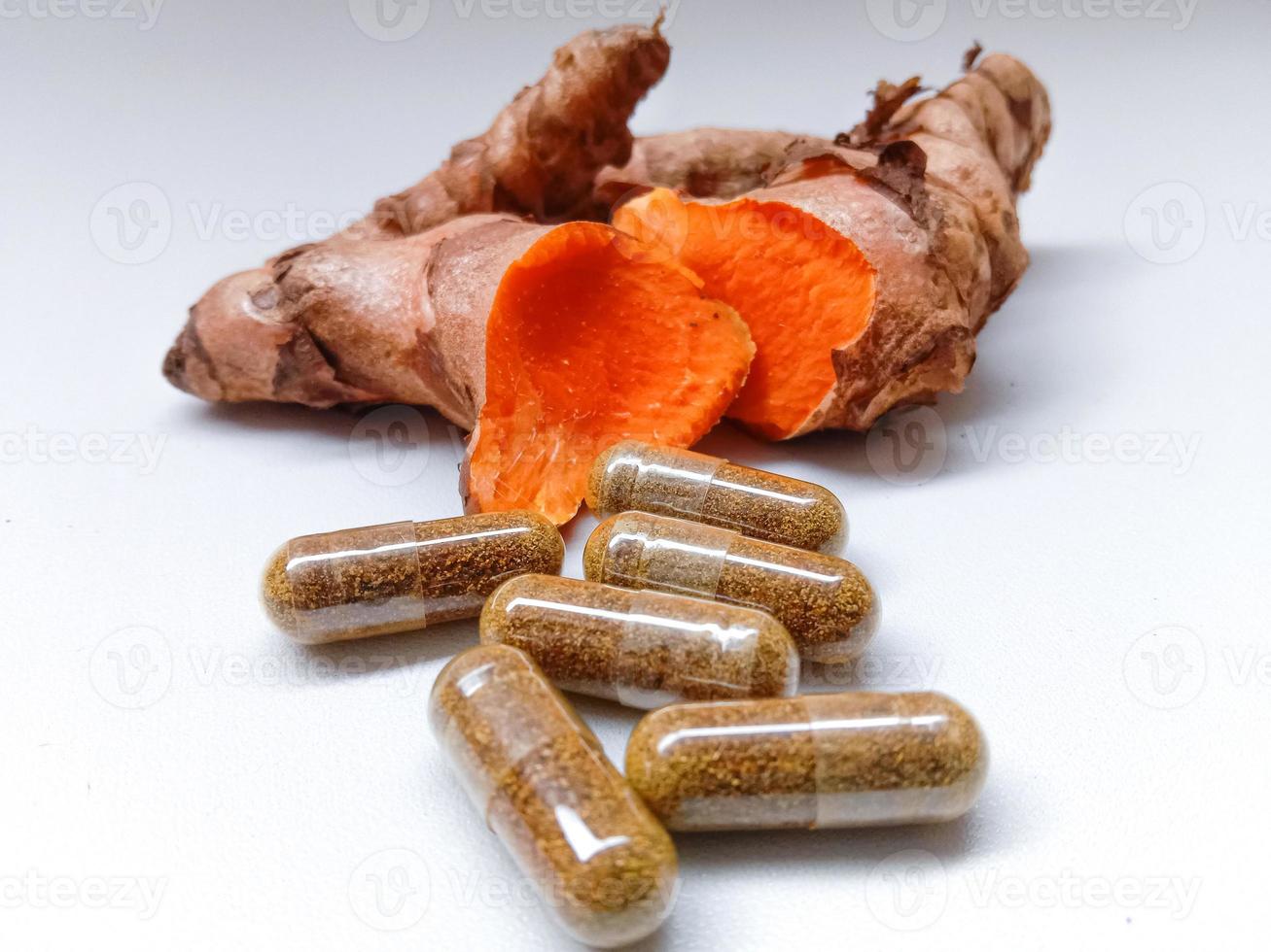 Capsules made from turmeric. photo
