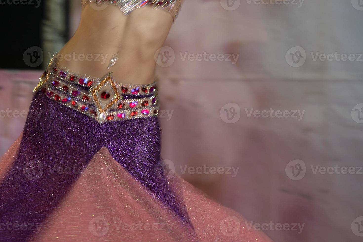 Oriental belly dancer beutiful move photo