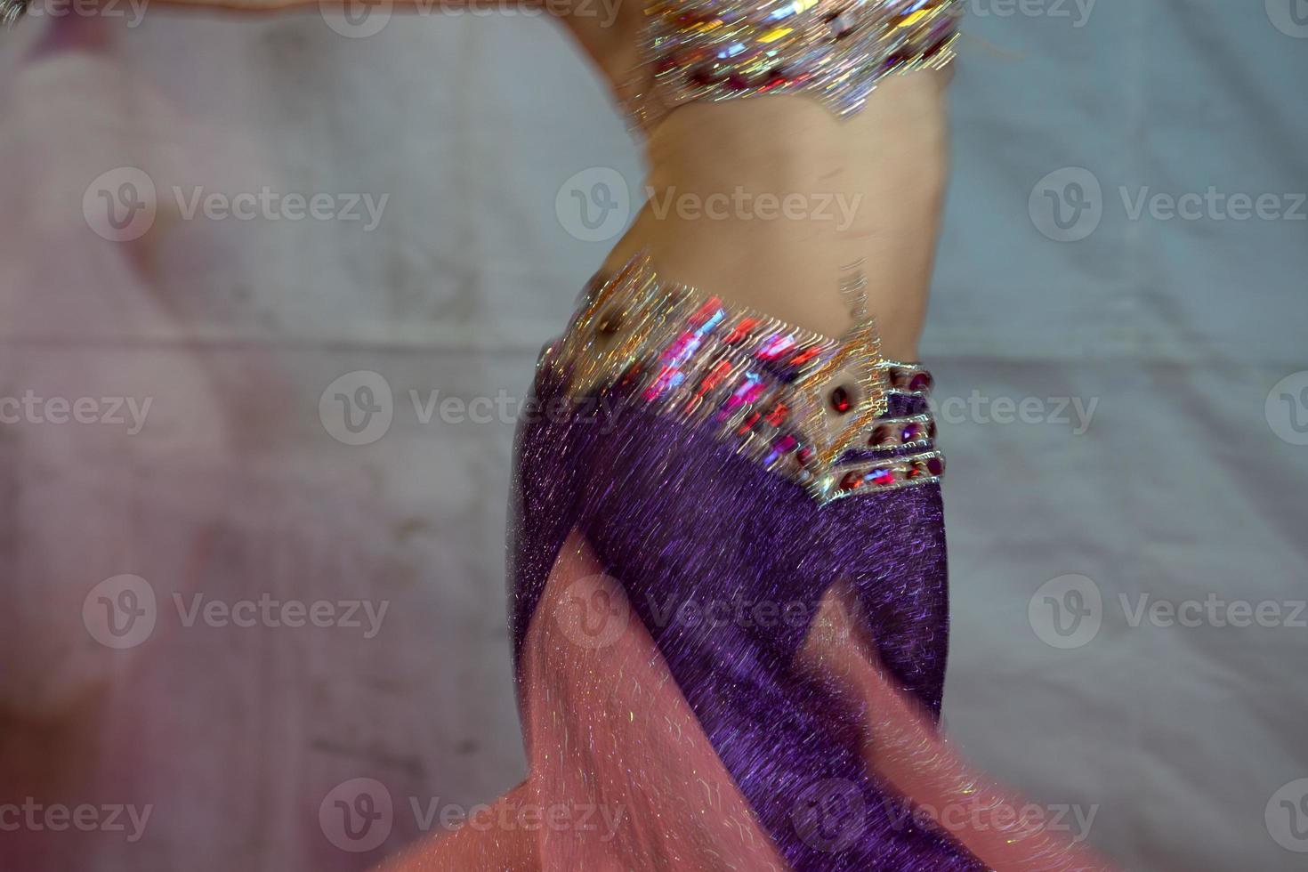 Oriental belly dancer beutiful move photo