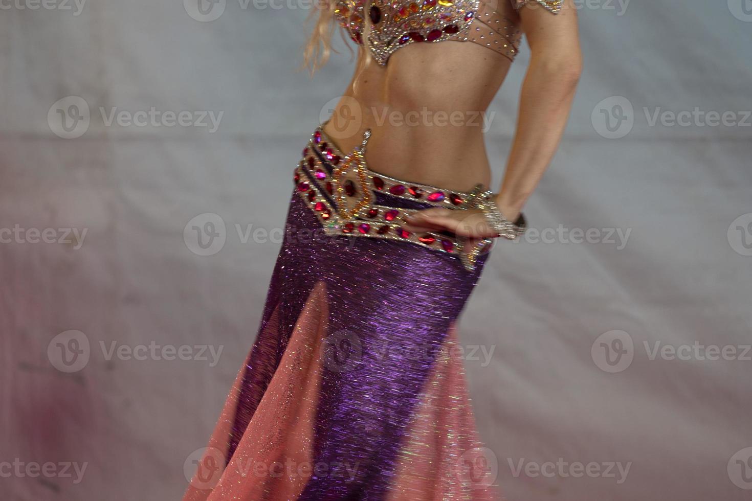 Oriental belly dancer beutiful move photo