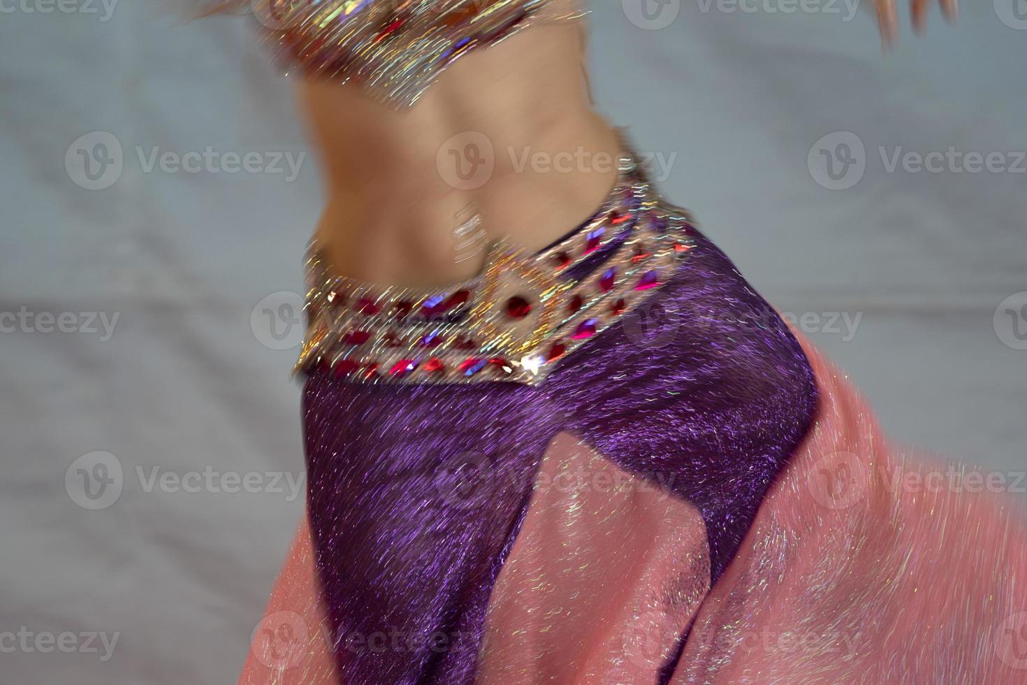 Oriental belly dancer beutiful move photo