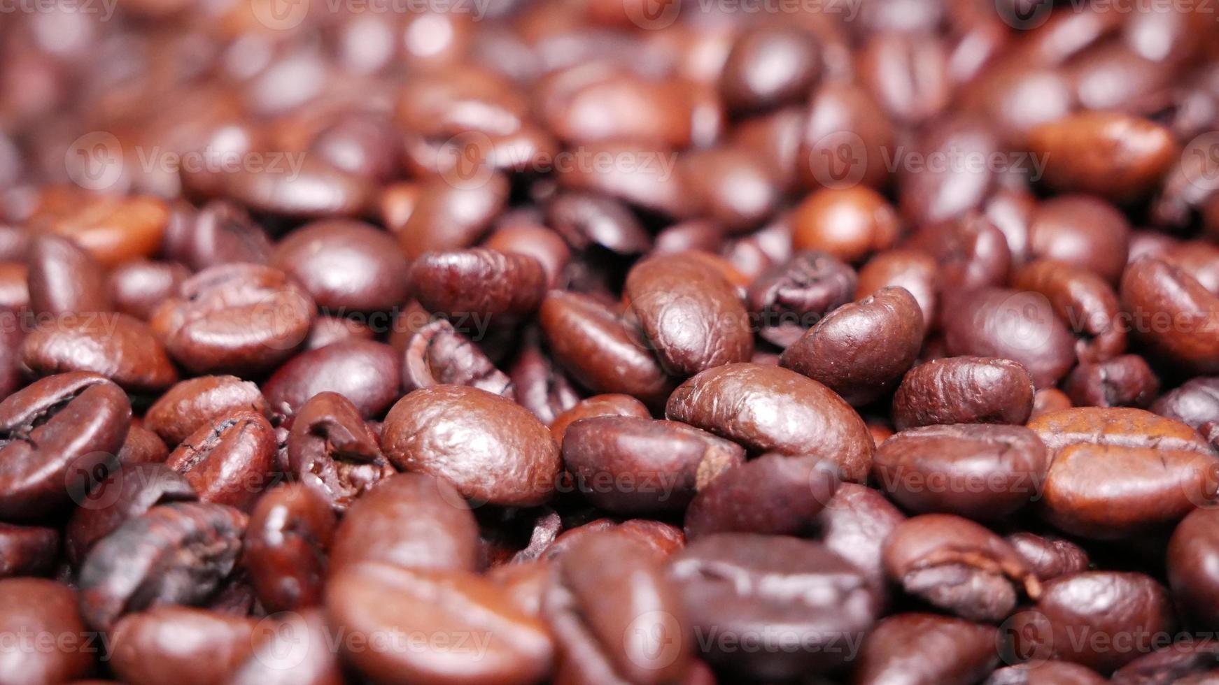 Freshly roasted coffee beans close up photo