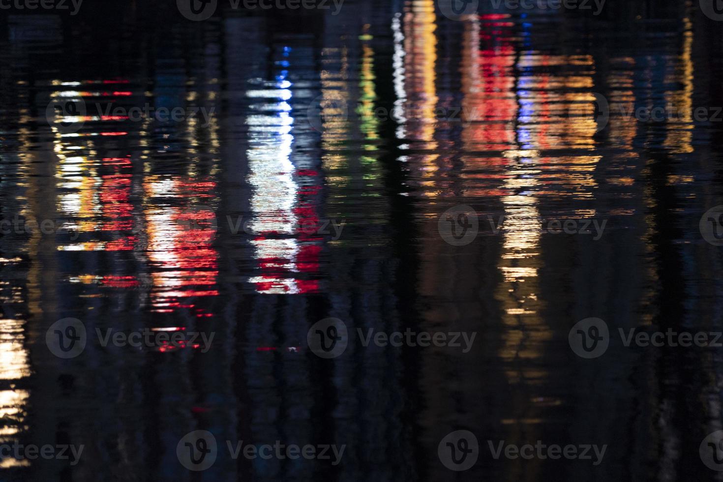 AMSTERDAM, NETHERLAND - old town canals red lights reflection photo