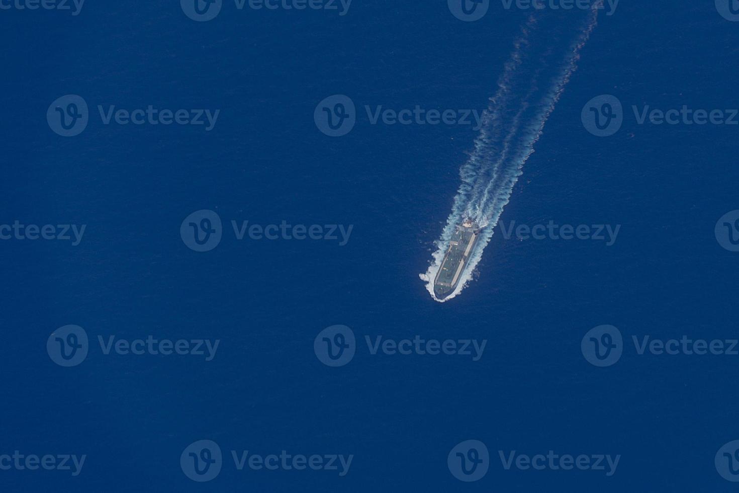 oil tanker ship aerial view in the deep blue ocean photo