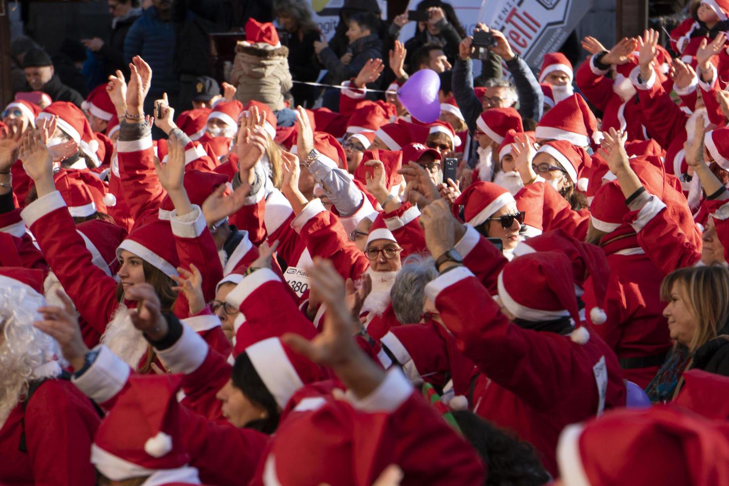 GENOA, ITALY - DECEMBER 22 2019 - Traditional Santa claus walk photo