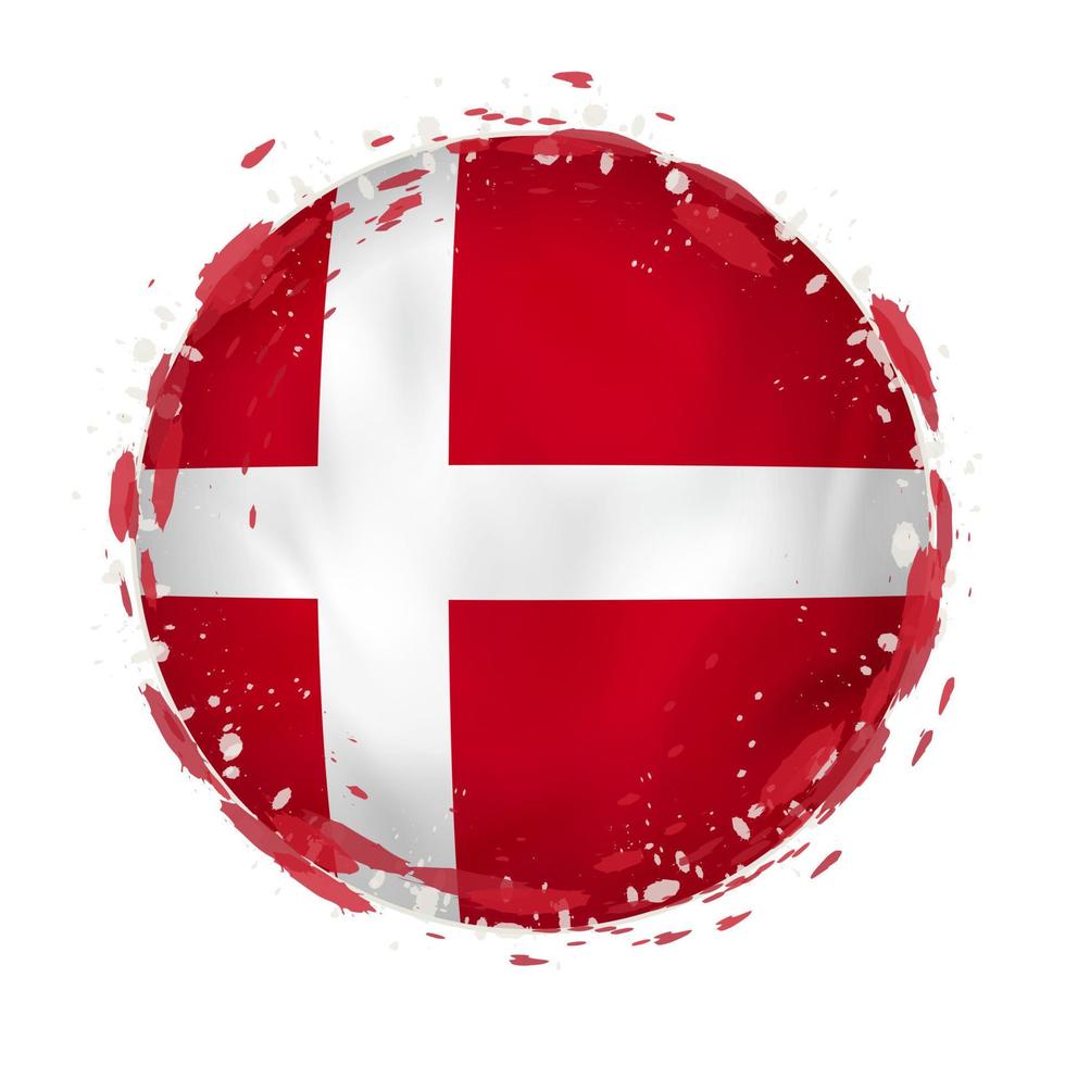 Round grunge flag of Denmark with splashes in flag color. vector