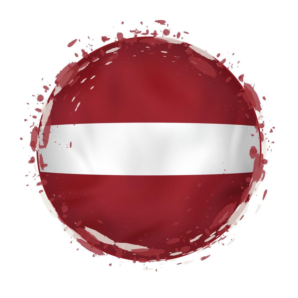 Round grunge flag of Latvia with splashes in flag color. vector