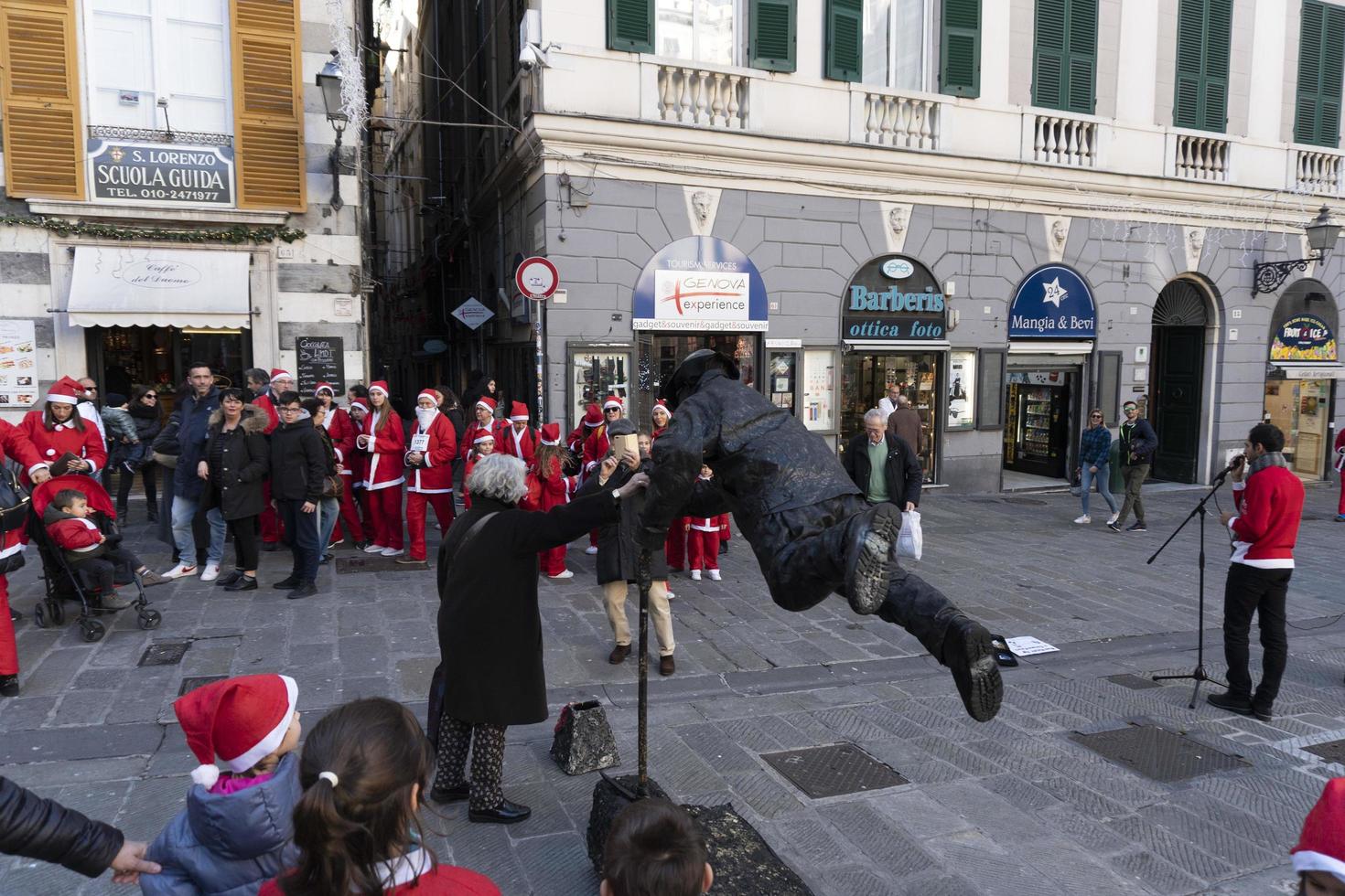 GENOA, ITALY - DECEMBER 22 2019 - Traditional Santa claus walk photo