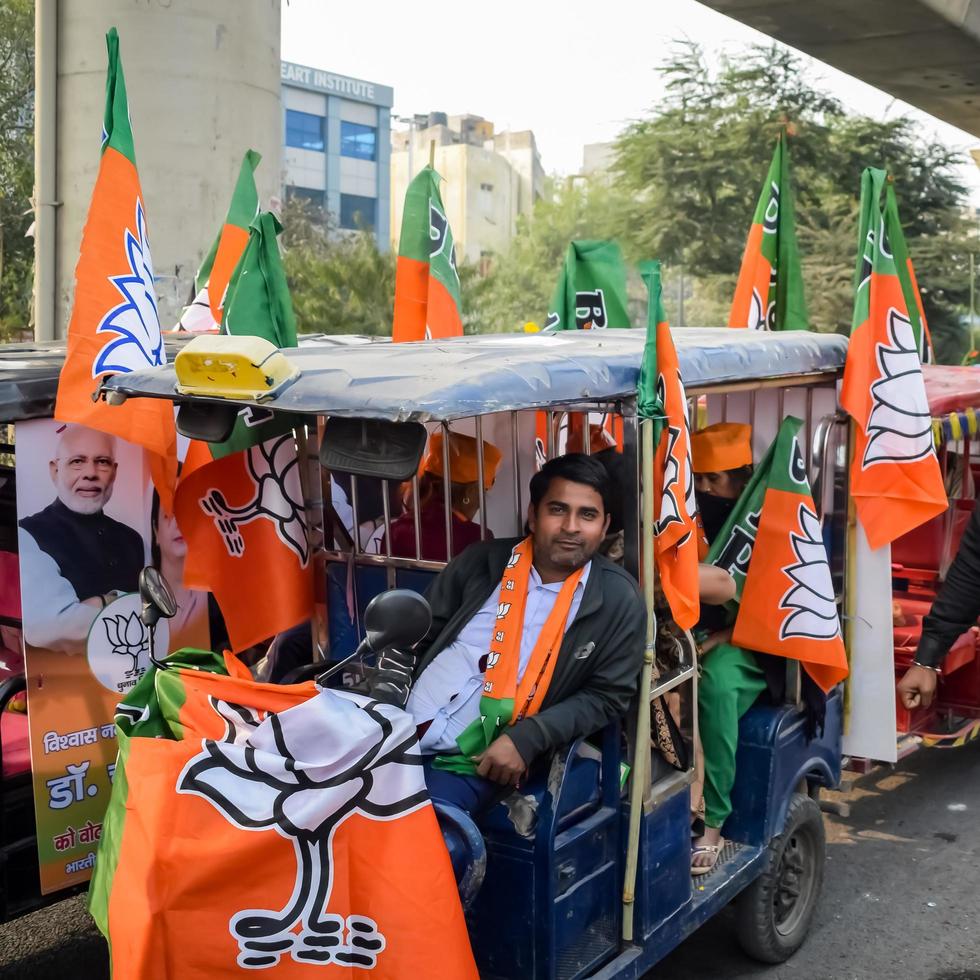Delhi, India, December 02 2022 -Bharatiya Janata Party BJP supporter during mega road show in support of BJP candidate Pankaj Luthara to file nomination papers ahead of MCD local body Elections 2022 photo