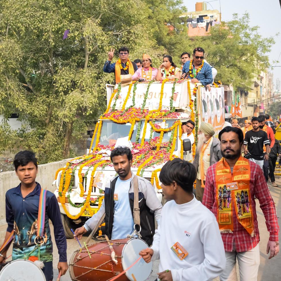 Delhi, India, December 02 2022 -Bharatiya Janata Party BJP supporter during mega road show in support of BJP candidate Pankaj Luthara to file nomination papers ahead of MCD local body Elections 2022 photo