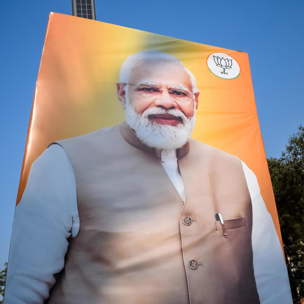 New Delhi, India - January 16 2023 - Prime Minister Narendra Modi cut out during BJP road show, the statue of PM Modi while attending a big election rally in the capital photo