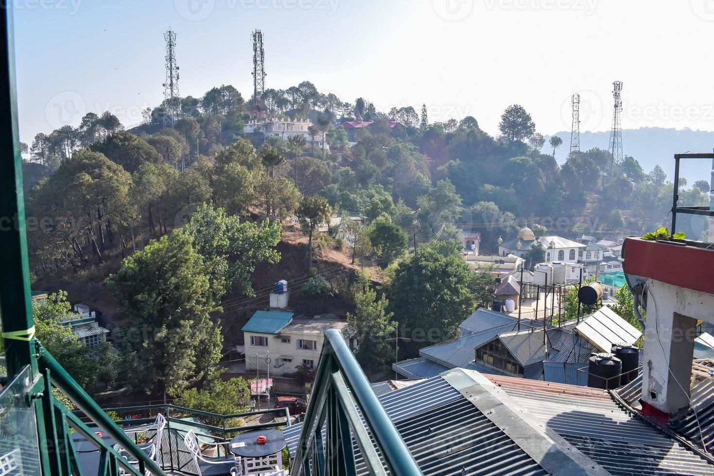 Early morning view of Modern rooftop restaurant at Kasauli, Himachal Pradesh in India, View of mountain hills from open air restaurant in Kasauli, Kasauli Rooftop restaurant photo