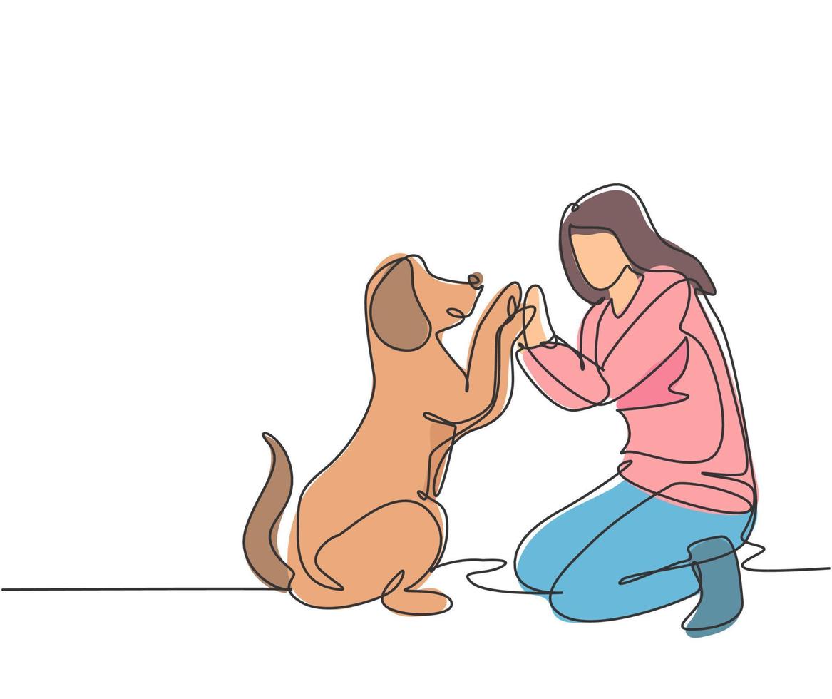 un dibujo de una joven mujer feliz en cuclillas y luego dando cinco gestos a su perro en el parque de campo como símbolo de la amistad. concepto de cuidado de mascotas. Ilustración de vector de diseño de dibujo de línea continua moderna