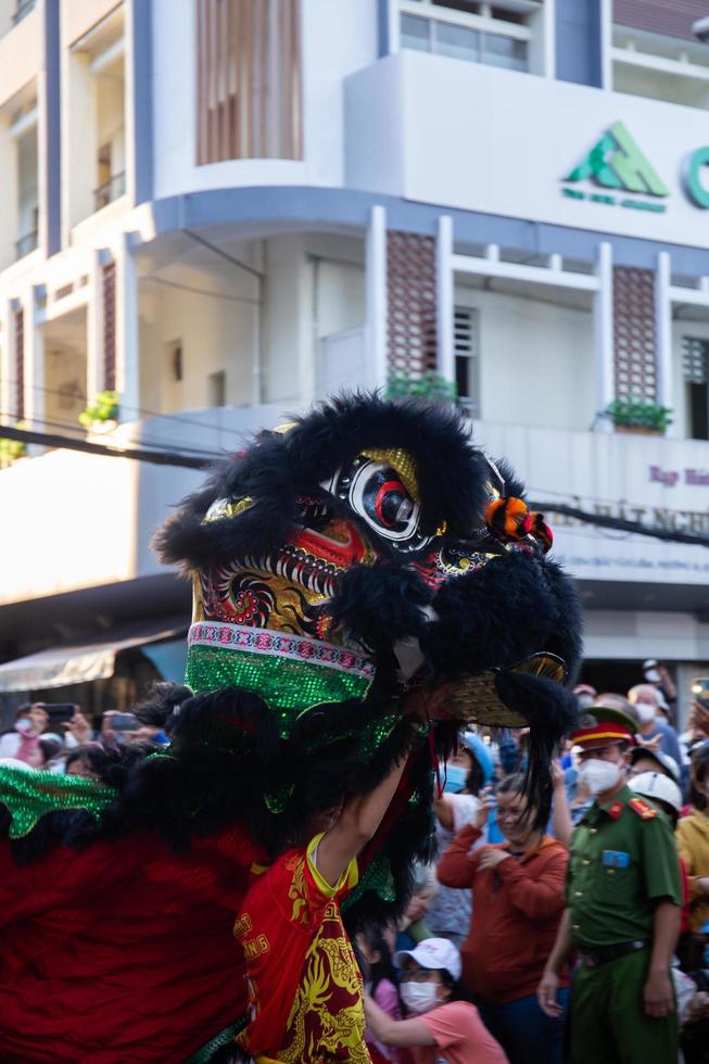 Ho Chi Minh city,Vietnam, 2023,Lunar New Year celebration - The dragon dance, beautiful colorful festive figure. Tet holiday background. Chinese Lunar New Year's Day, Spring Festival. photo