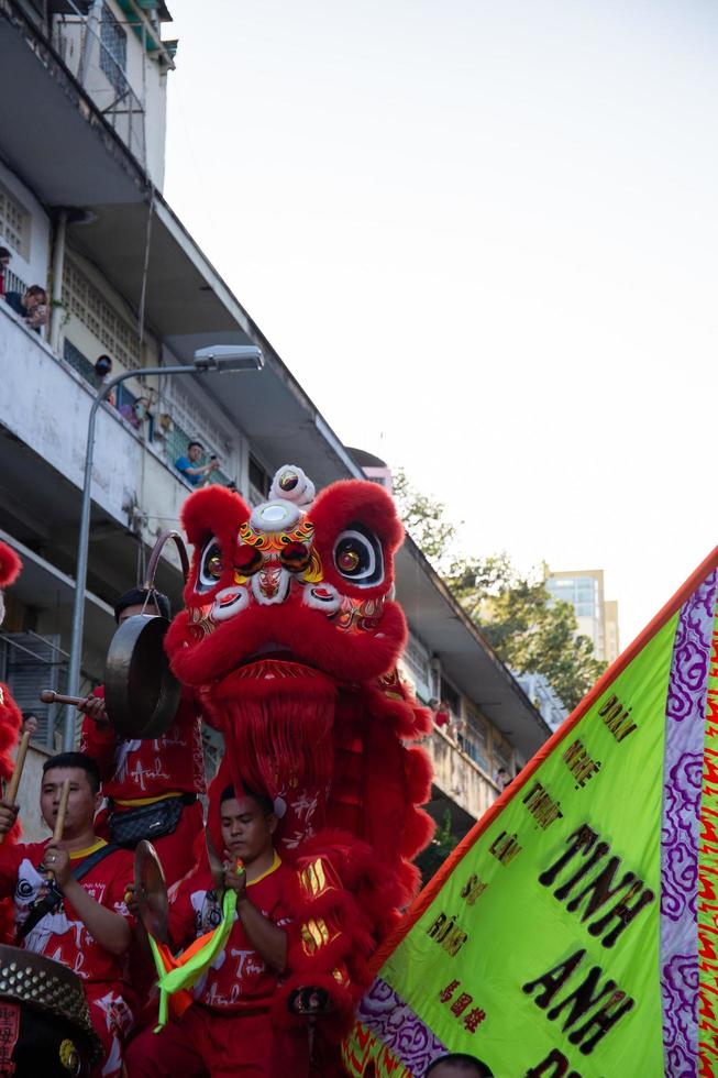 Ho Chi Minh city,Vietnam, 2023,Lunar New Year celebration - The dragon dance, beautiful colorful festive figure. Tet holiday background. Chinese Lunar New Year's Day, Spring Festival. photo