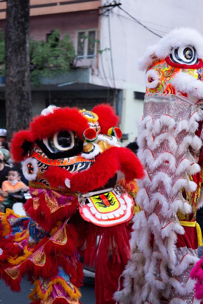 Ho Chi Minh city,Vietnam, 2023,Lunar New Year celebration - The dragon dance, beautiful colorful festive figure. Tet holiday background. Chinese Lunar New Year's Day, Spring Festival. photo