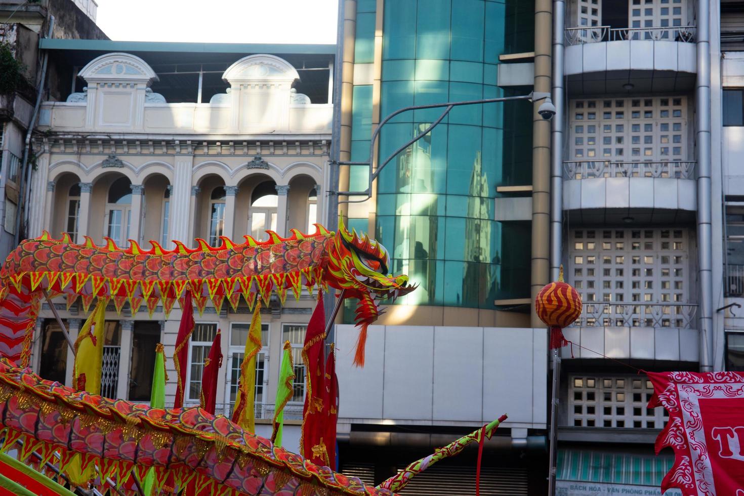 Ho Chi Minh city, Vietnam,2023 Lunar New Year celebration - The dragon dance, beautiful colorful festive figure. Tet holiday background. Chinese Lunar New Year's Day, Spring Festival. photo