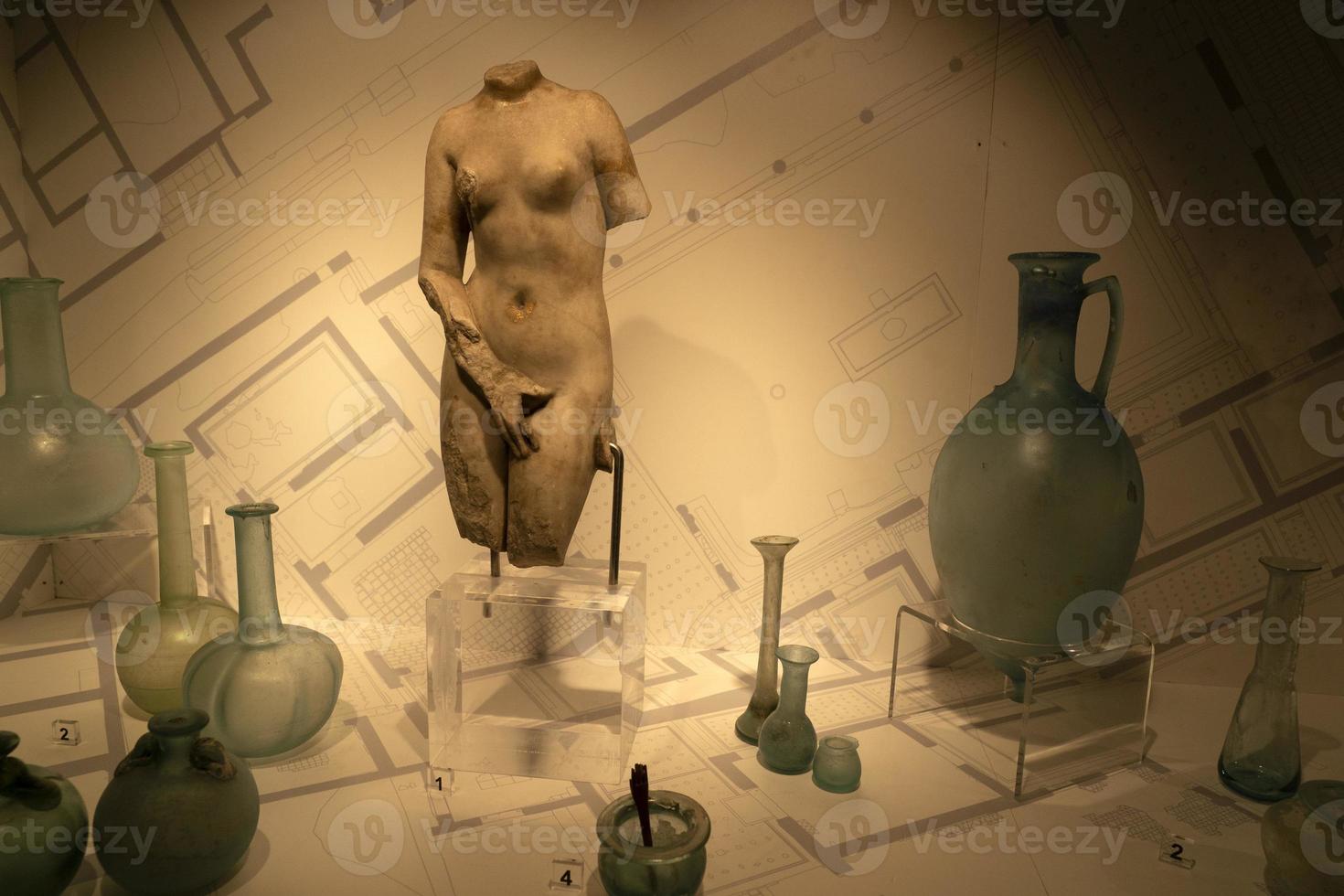 ERCOLANO, ITALY - FEBRUARY 2 2020 - Ercolano Herculaneum ancient ruins gold  exhibit photo
