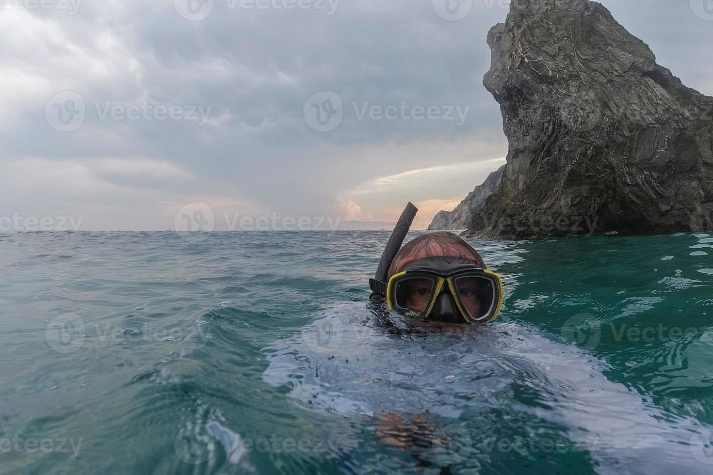 monterosso cinque terre panorama rock at sunset from the sea photo