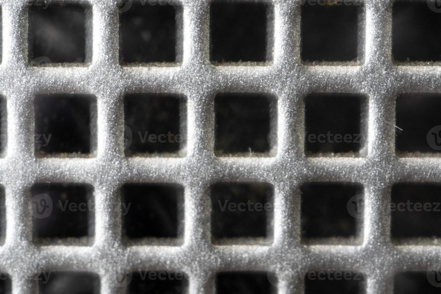 speaker metallic grid close up photo
