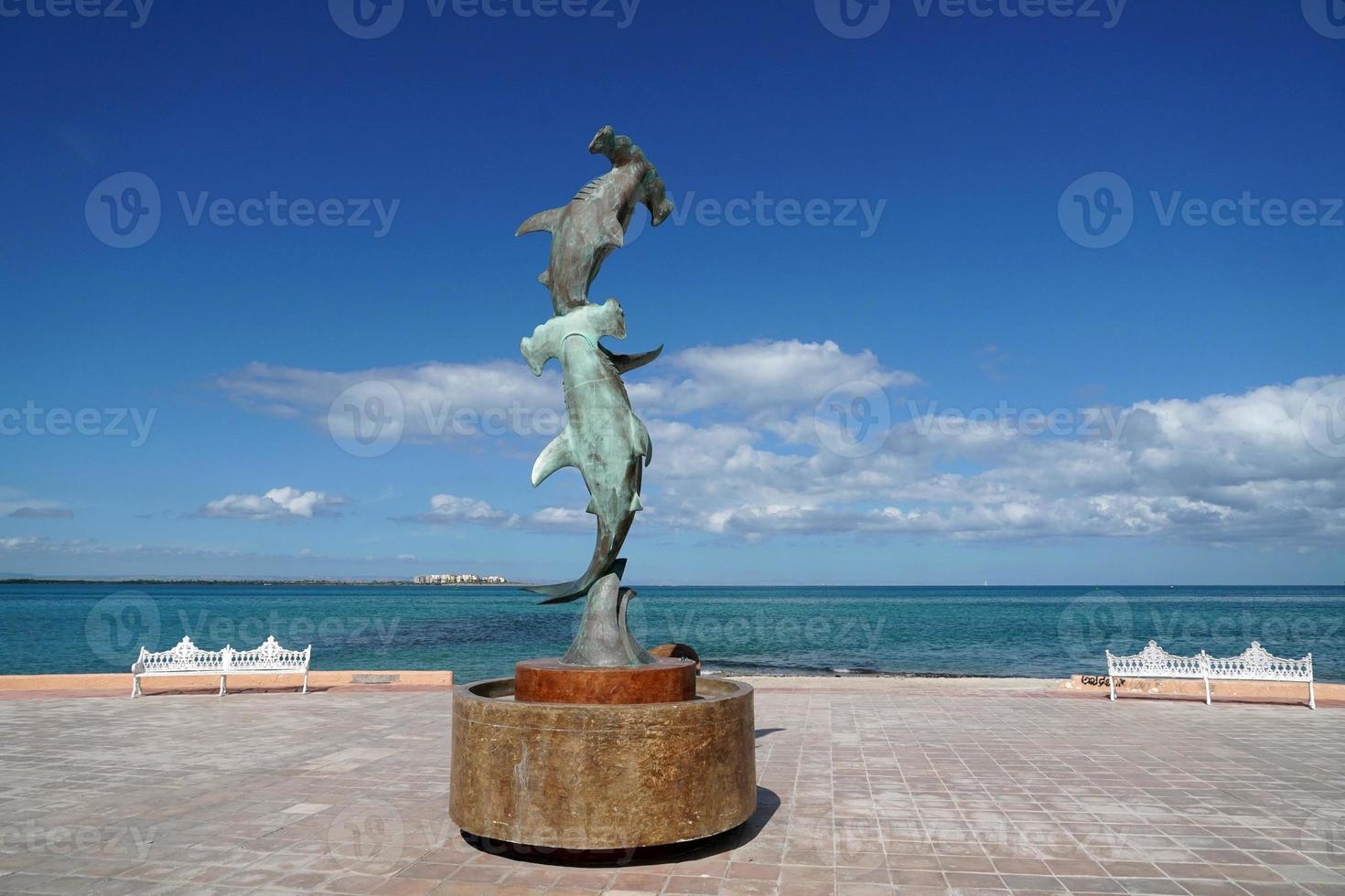 hammered shark statue in La Paz Baja California Sur, Mexico beach promenade called Malecon photo