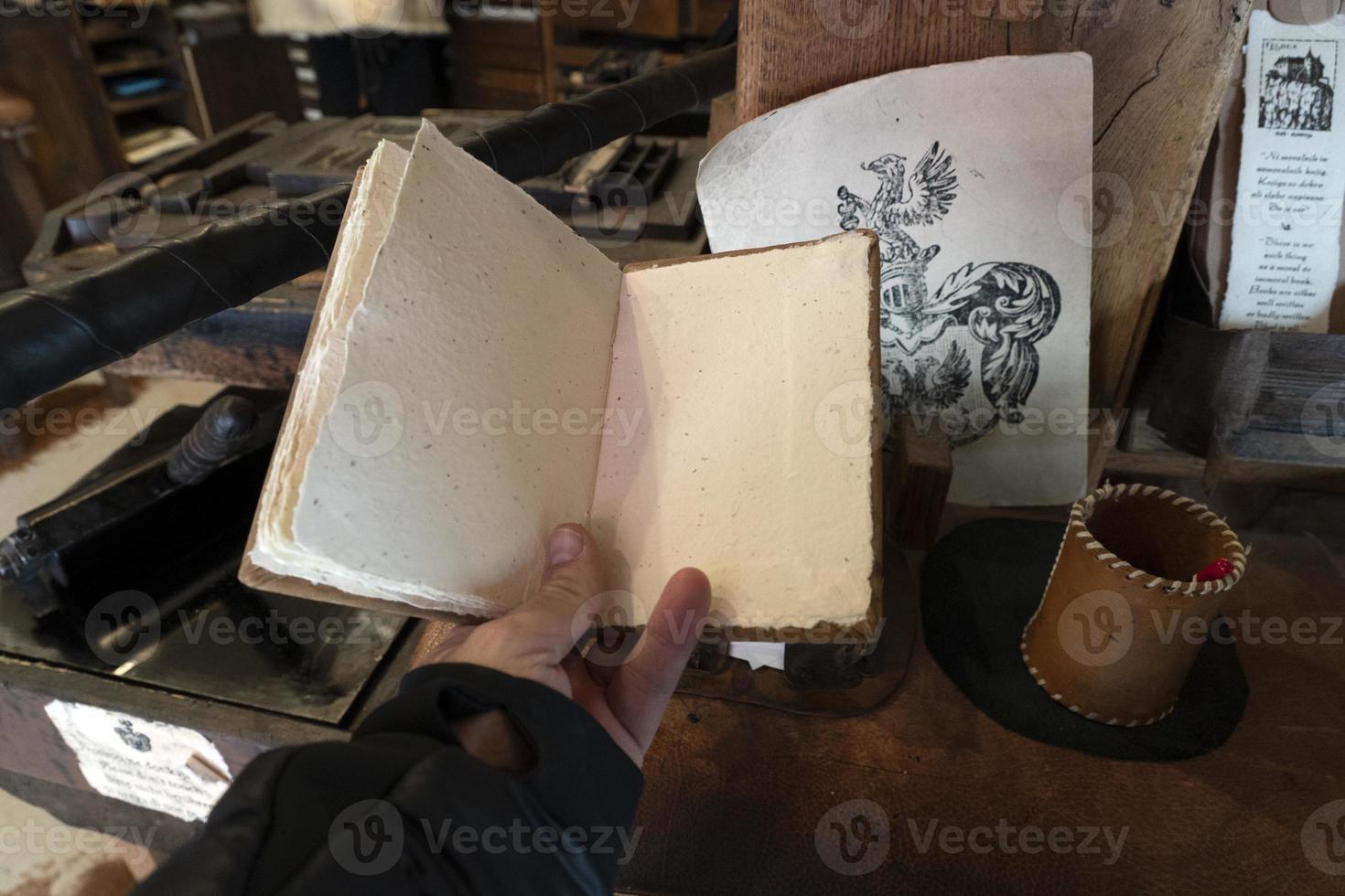 Old ancient print machine hand press photo