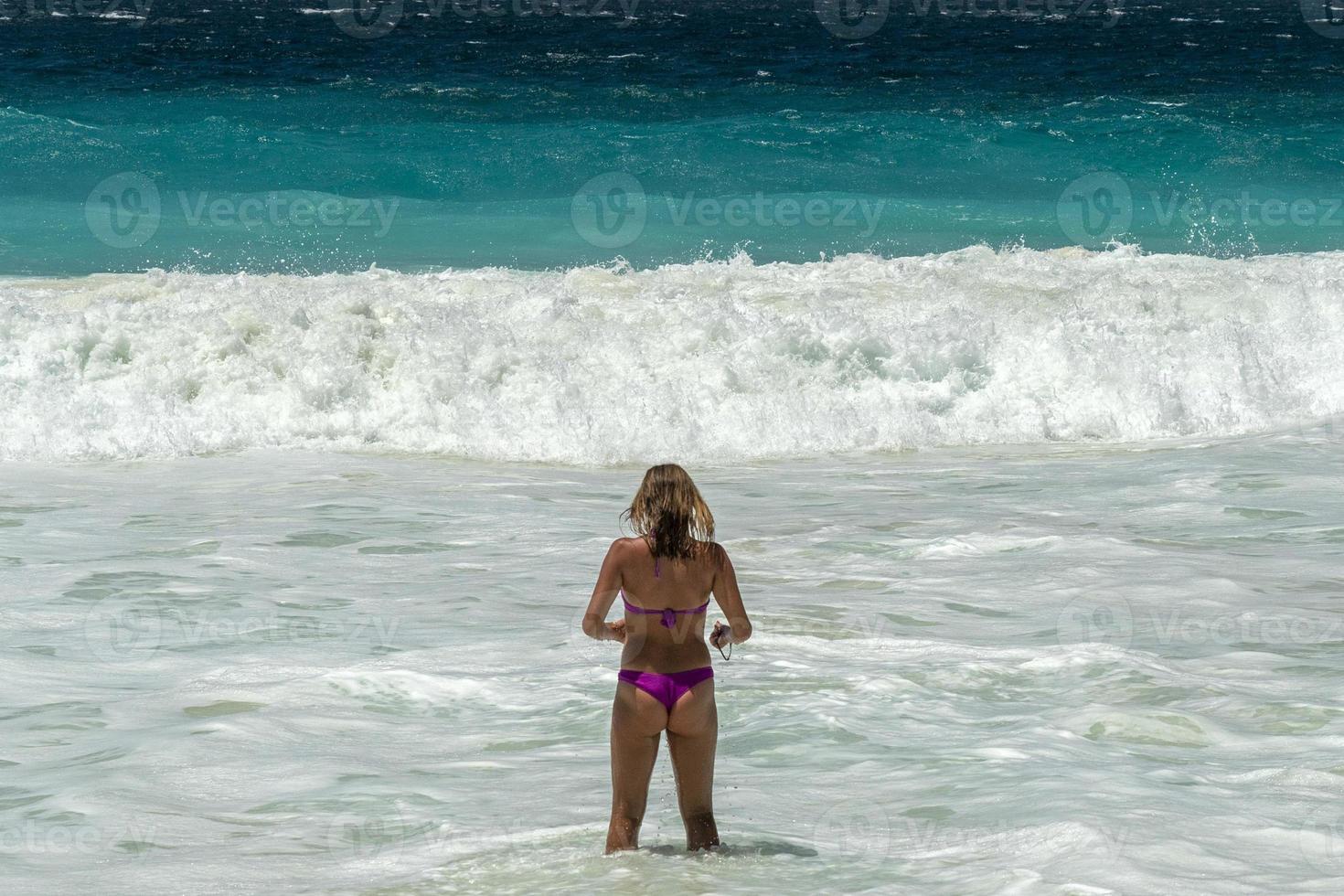 beautiful girl on tropical sandy beach photo