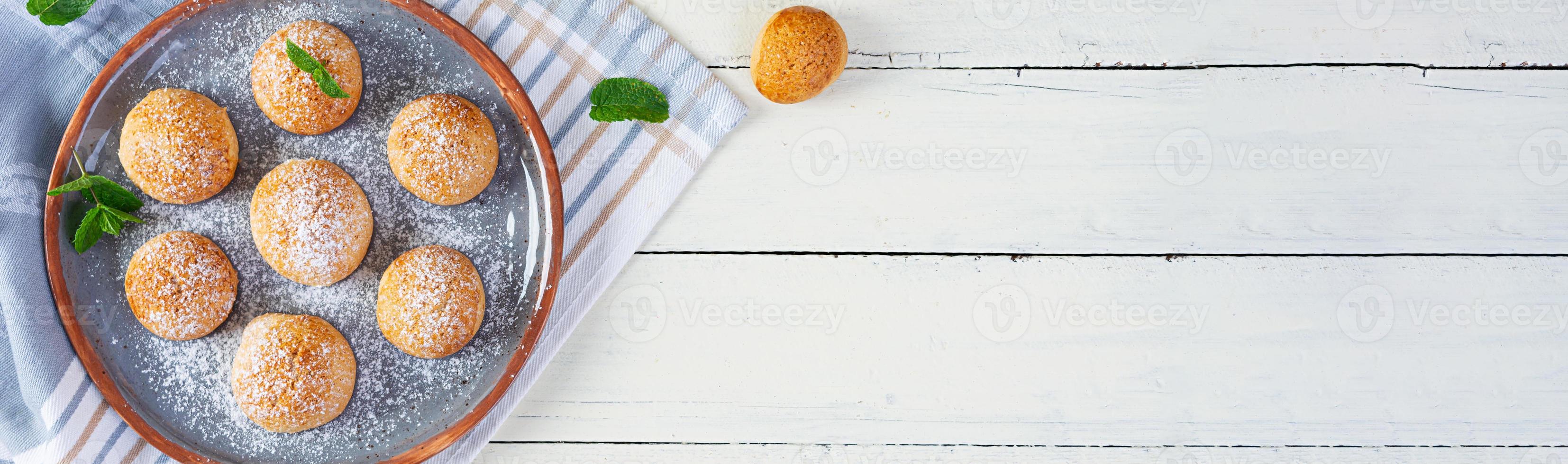 Butter cookies on wooden background. Delicious honey gingerbread photo