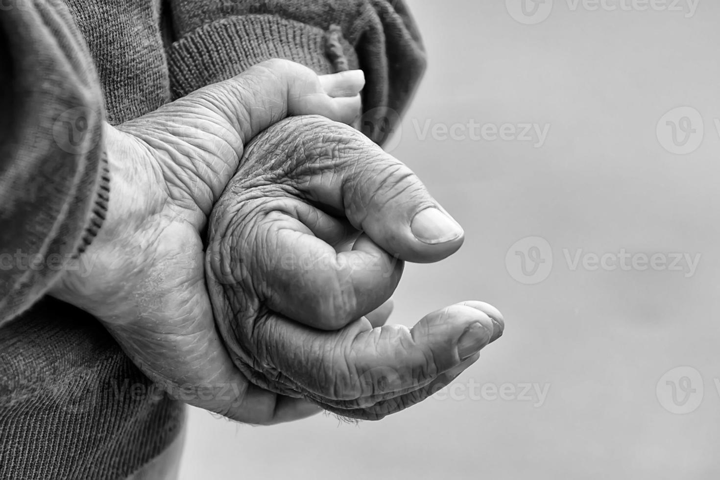 Farmer Hands of old man who worked hard in his life photo