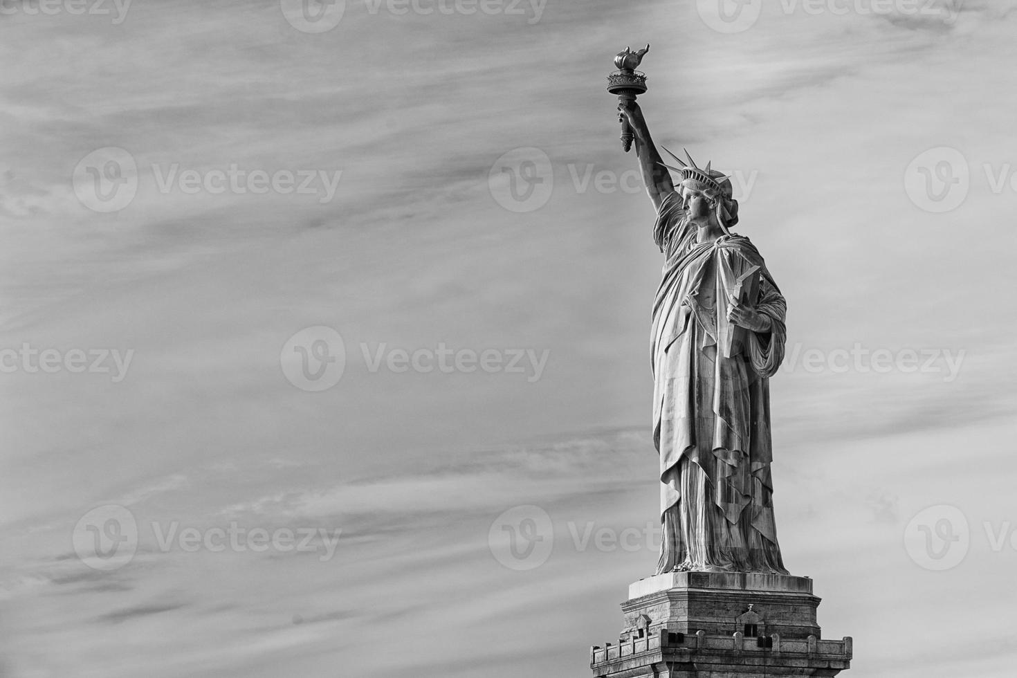 New York statue of liberty vertical silhouette b and w photo