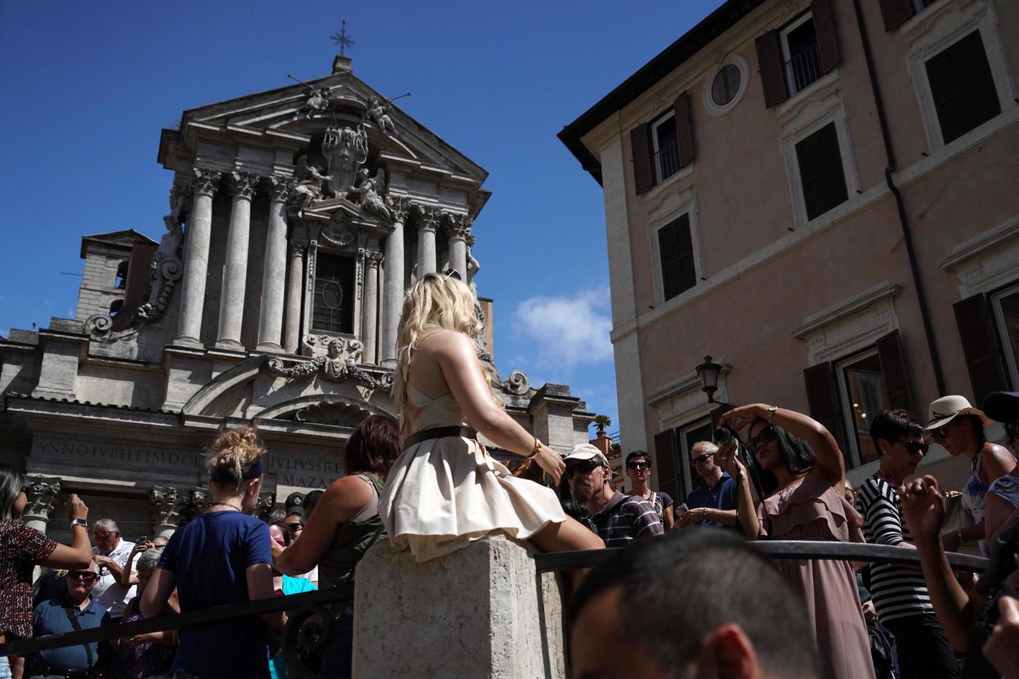 ROME, ITALY - JUNE 10 2018 - Trevi Fountain crowded of tourists photo