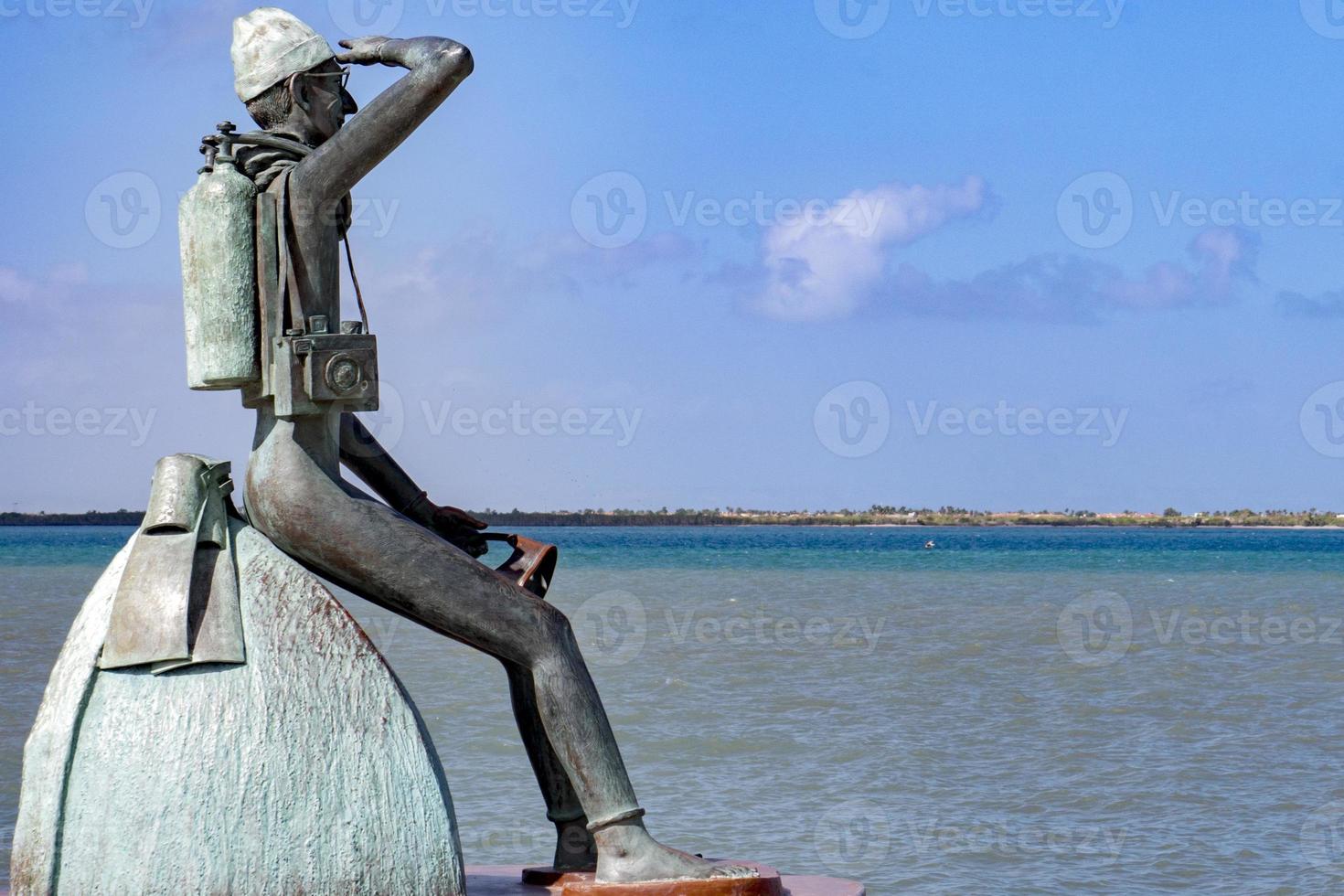 Jacques Cousetau copper statue in mallejon la Paz Baja California Sur photo