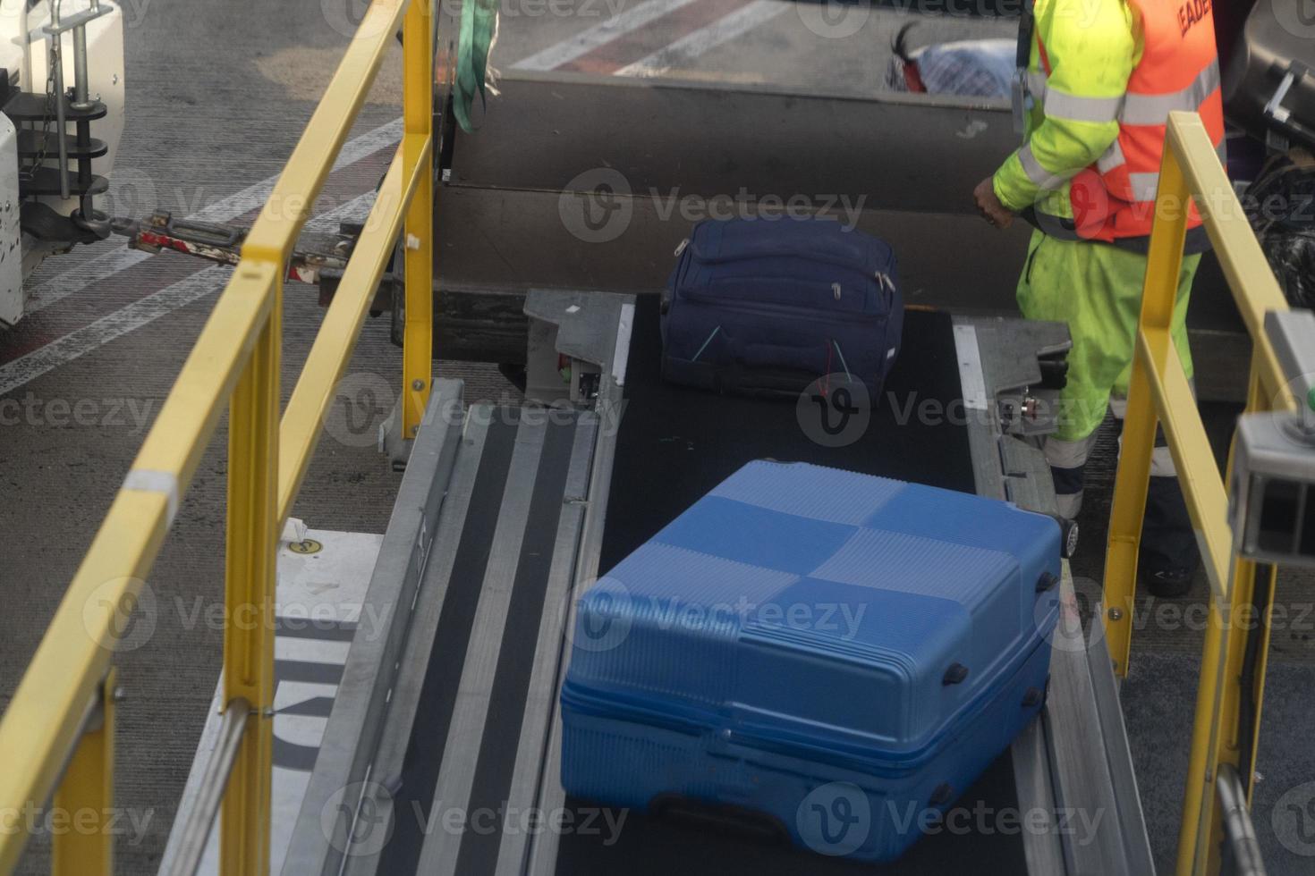 luggage loading on airplane photo