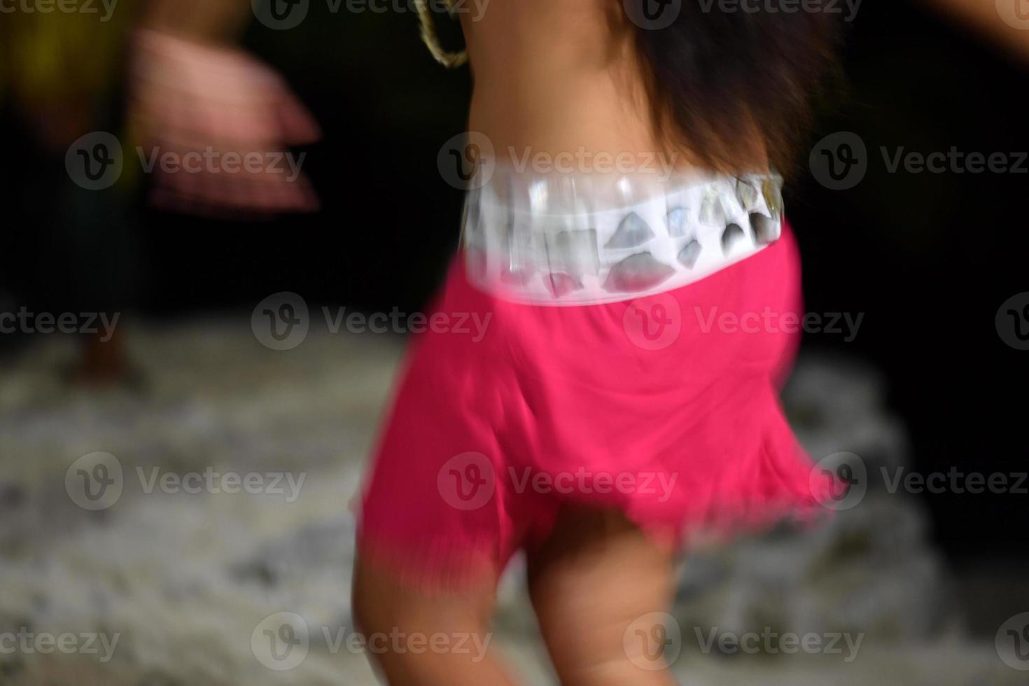 Polynesian dancer hula move effect photo