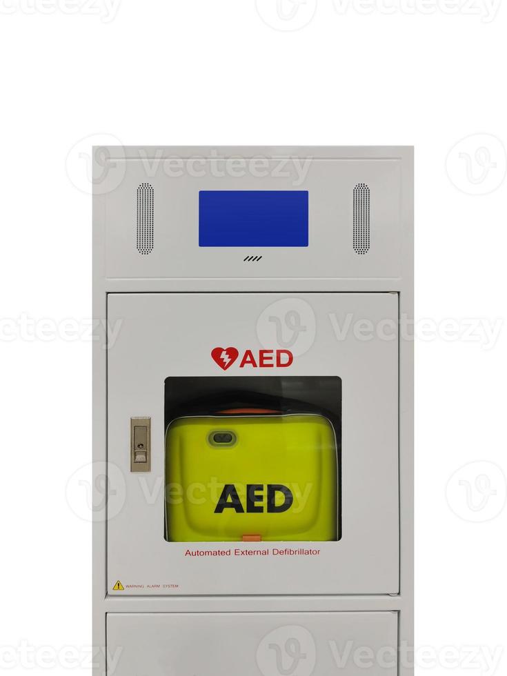 Automatic electric defibrillator isolated on white background photo