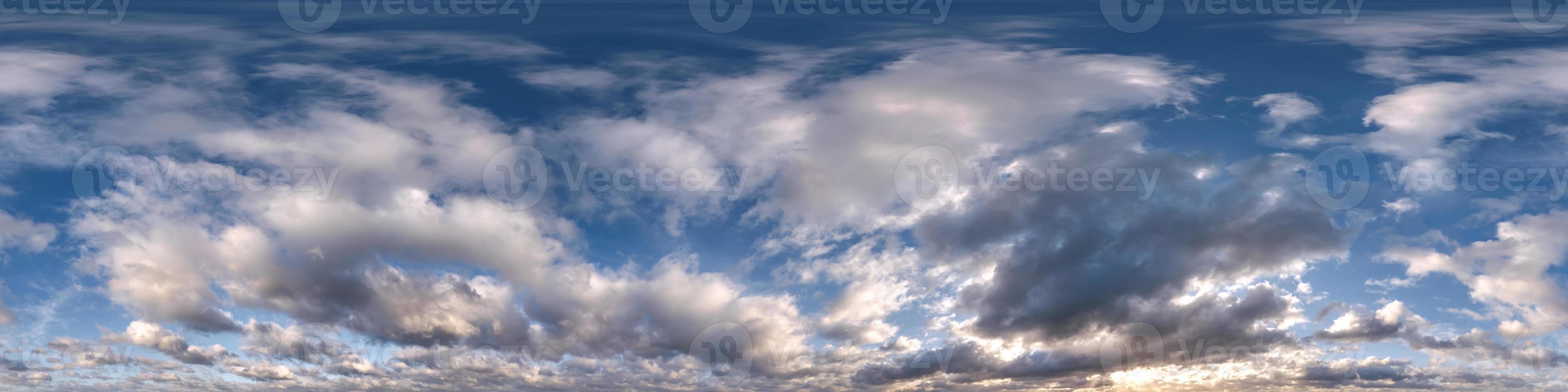 sunset sky with evening clouds as seamless hdri 360 panorama view with zenith in spherical equirectangular format for use in 3d graphics or game development as sky dome or edit drone shot photo