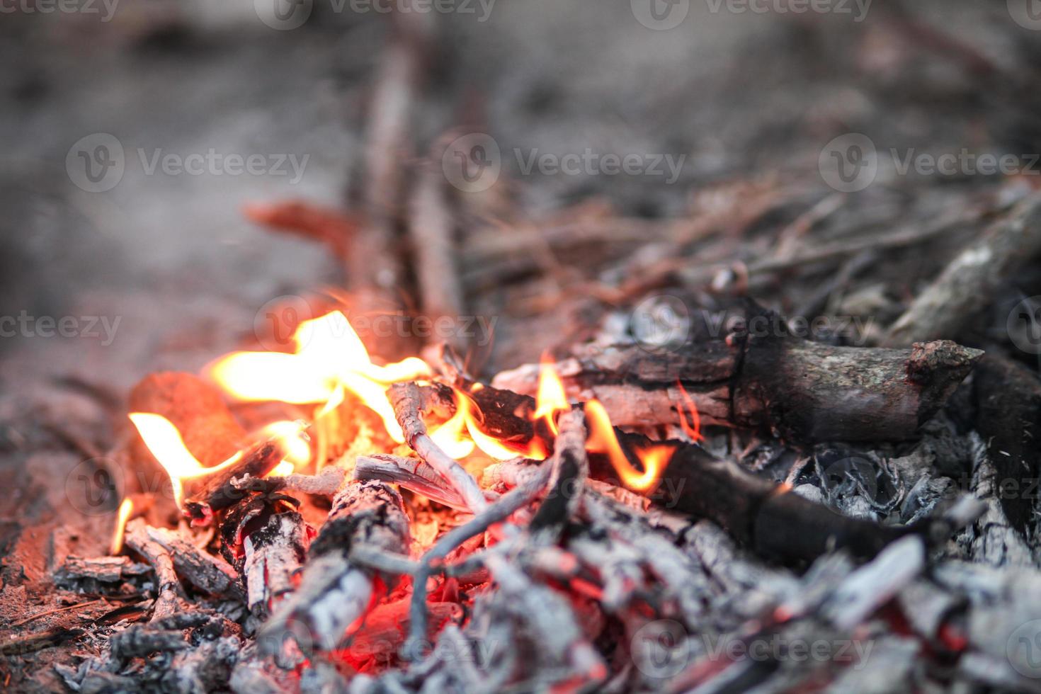 Bonfire in winter , Burning fire against the cold morning wind. photo