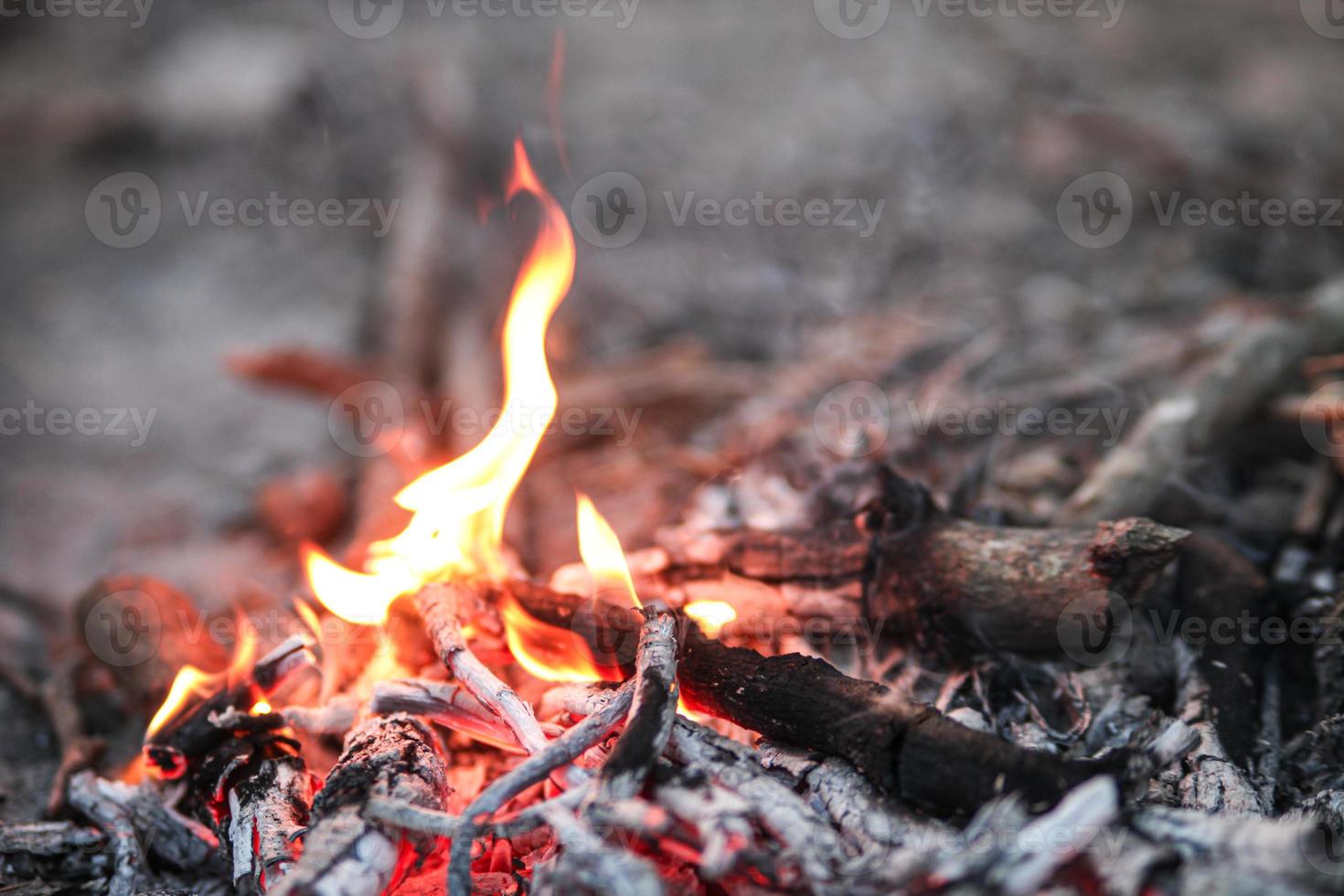 Bonfire in winter , Burning fire against the cold morning wind. photo