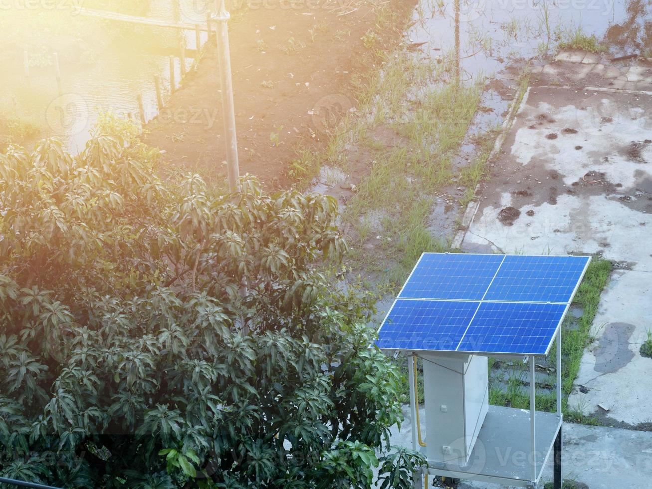 Outdoor solar cell windmill alternative energy power system engineer electronic technology generator industry photovoltaic sunlight skyblue clean ecology natural field farm resource sustainable photo