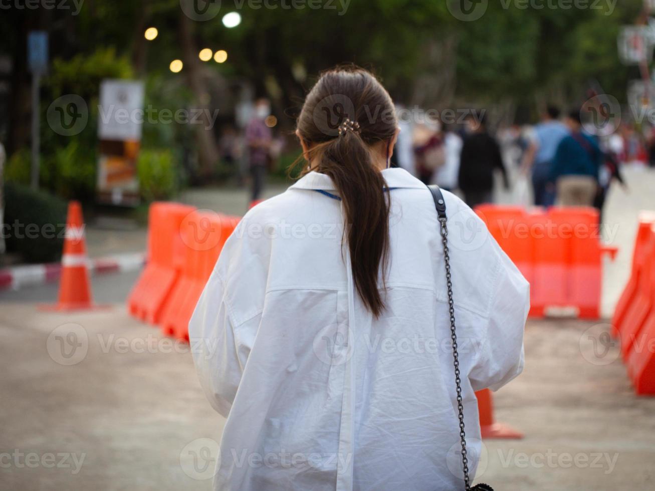 Backside people female person lady walking travel lifestyle holiday vacation journey adventure trip tourist  freedom outdoor summer spring season time background wallpaper portrait international ac photo