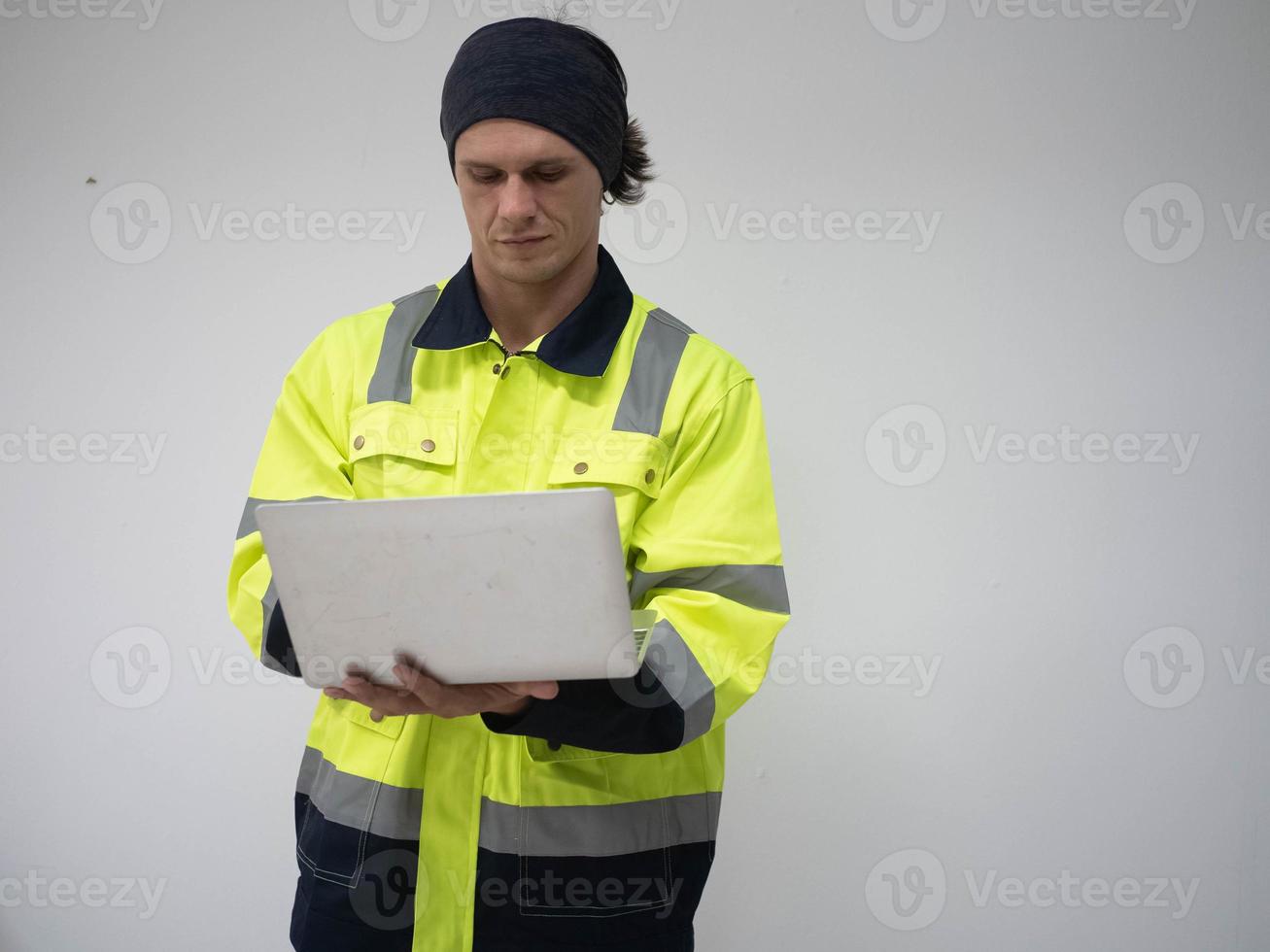 man person wear uniform factory company manager supervisor labor staff hold notebook tablet  mobile technology electronic computer work job keyboard white isolated background copy space concept photo