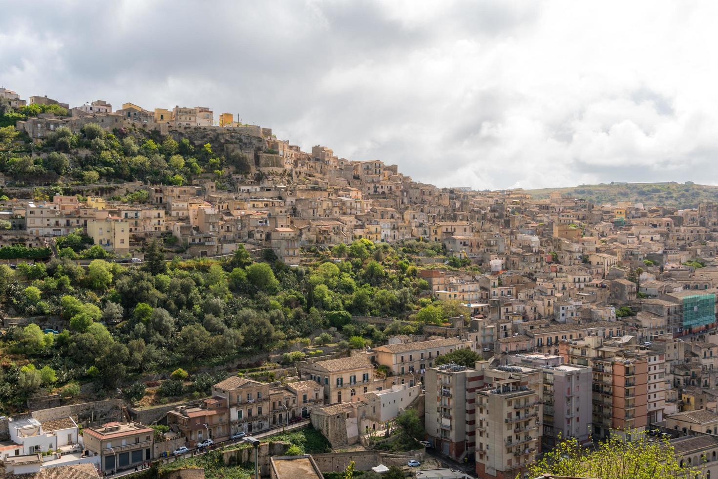 Modica, Italy-May 8, 2022-Panoramic view of the characteristic city of Modica in Sicily during a cloudy day photo