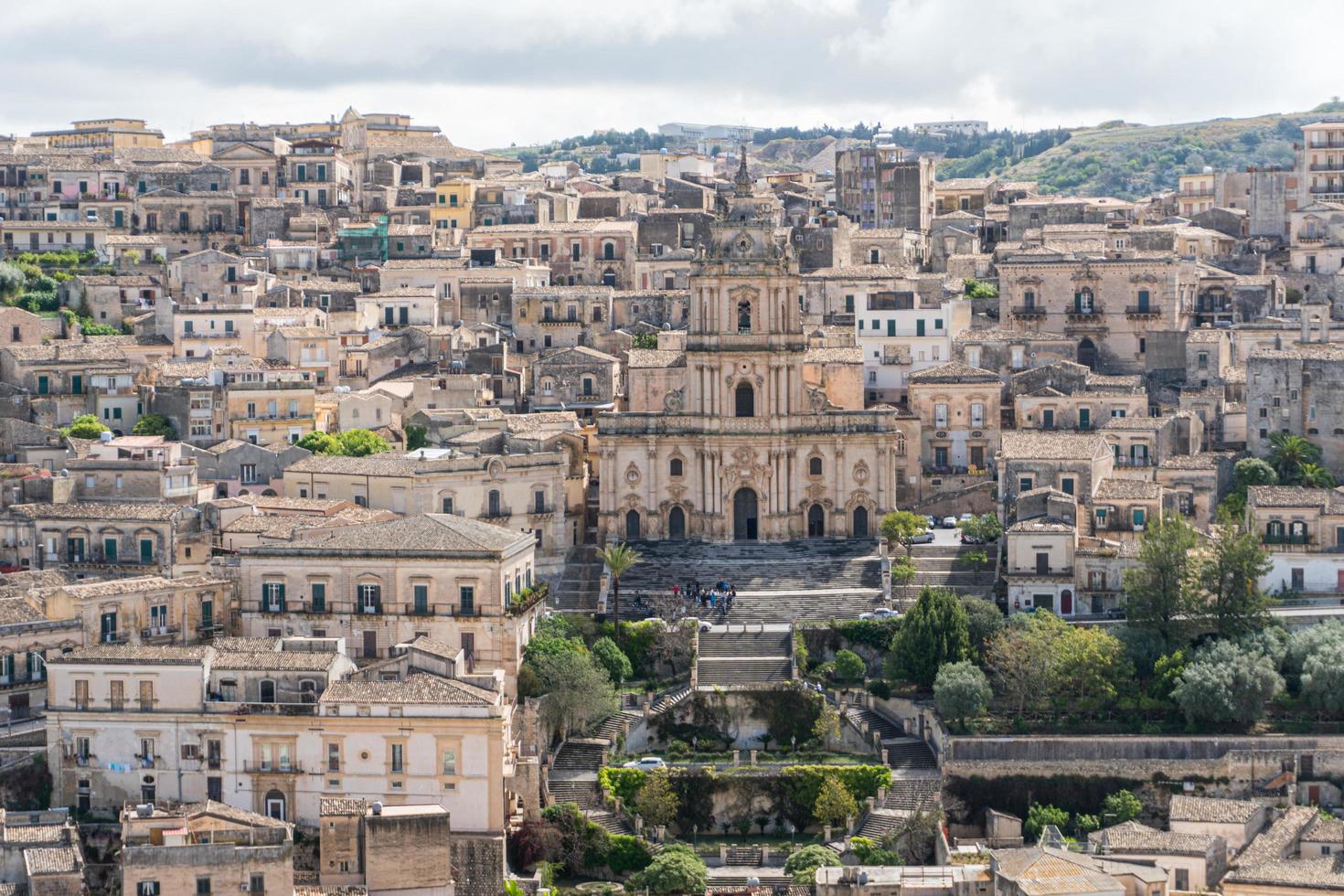 Modica, Italy-May 8, 2022-Panoramic view of the characteristic city of Modica in Sicily during a cloudy day photo
