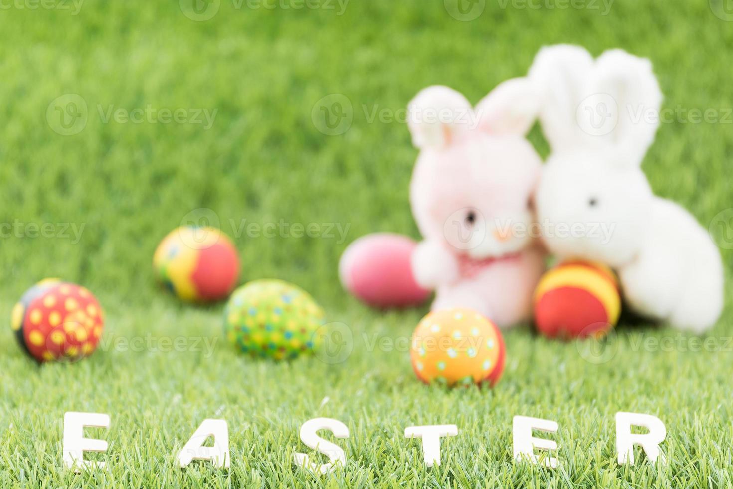 Bunny toys and Easter eggs with text photo