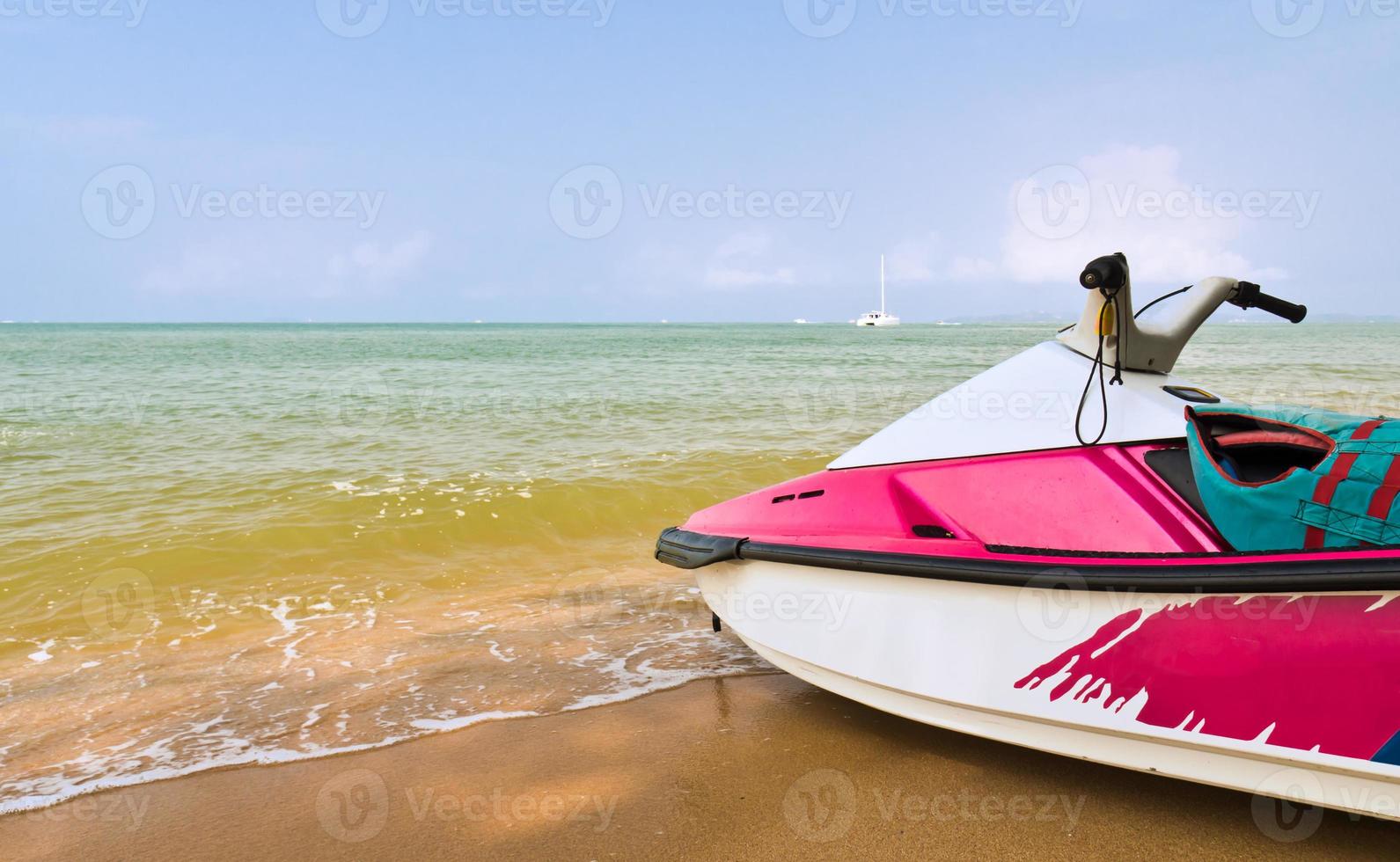 Water scooters on sand photo