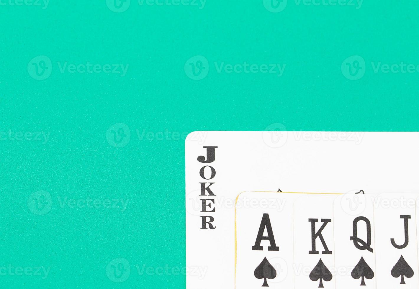 Cards on green casino table photo