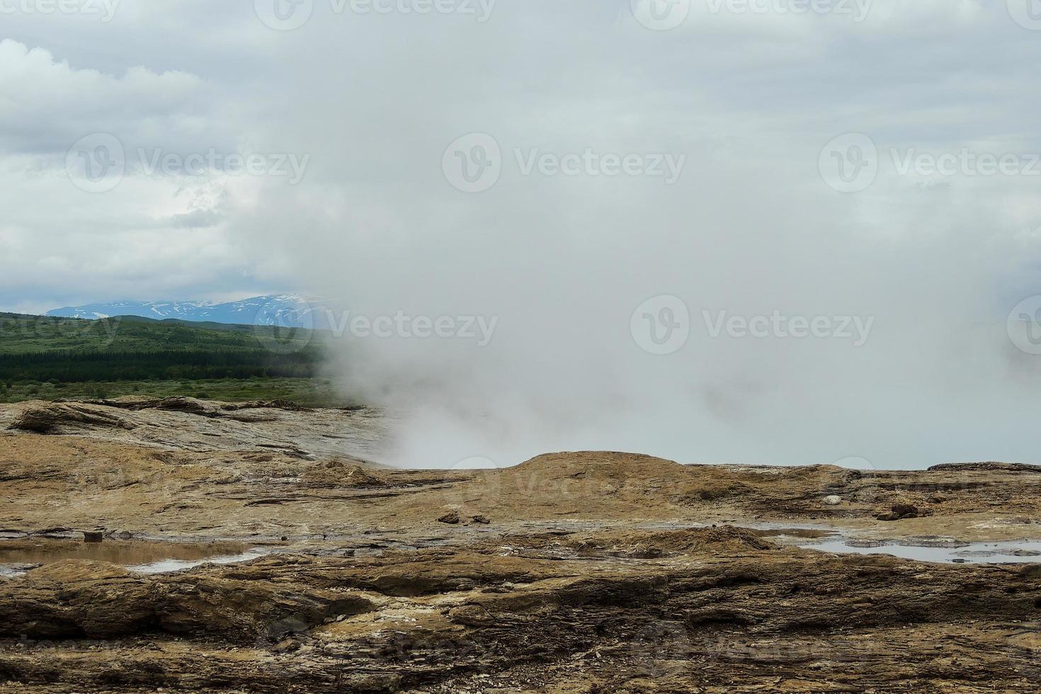 Famous Iceland Geysir in Geothermal Area of Haukadalur Valley photo