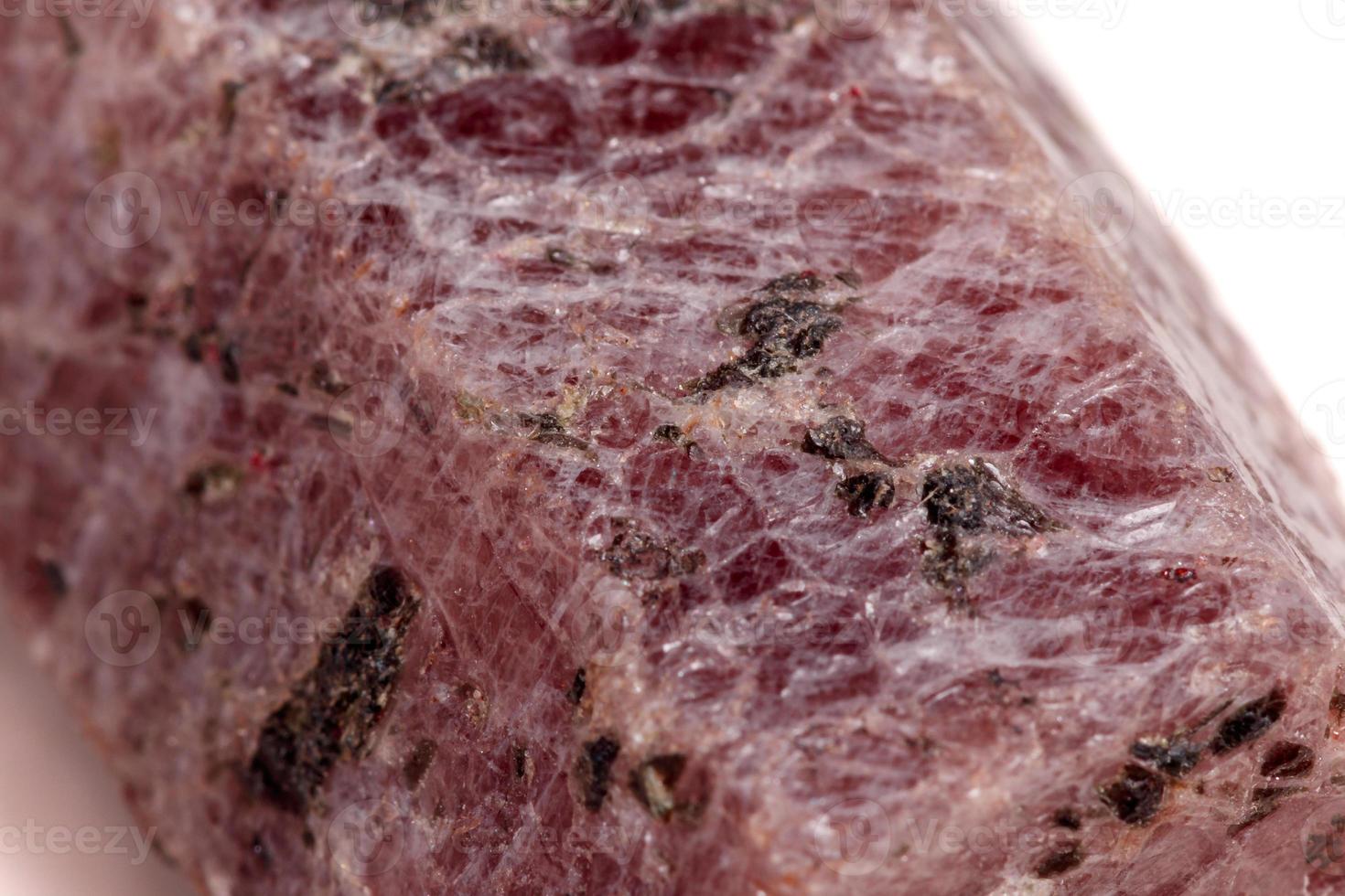Macro mineral stone Ruby in the breed a white background photo
