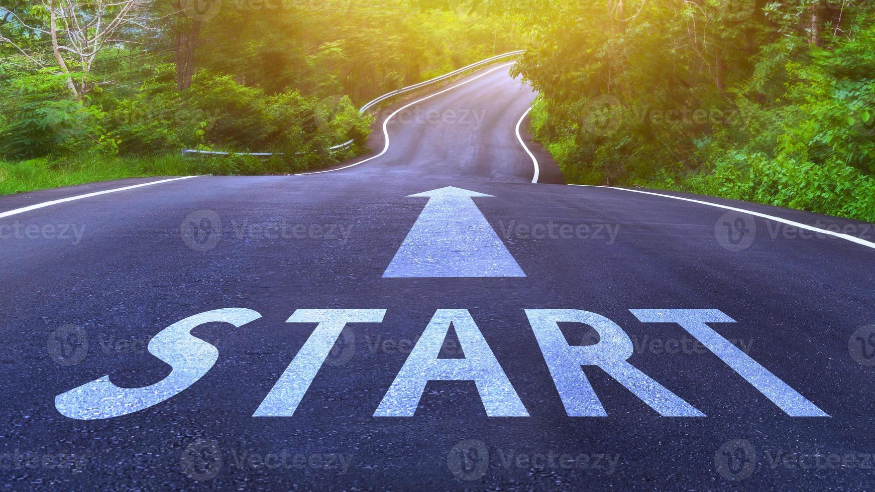 Start line on highway concept for business planning strategies and challenges or career path opportunities and change, road to success concept, start word on street photo